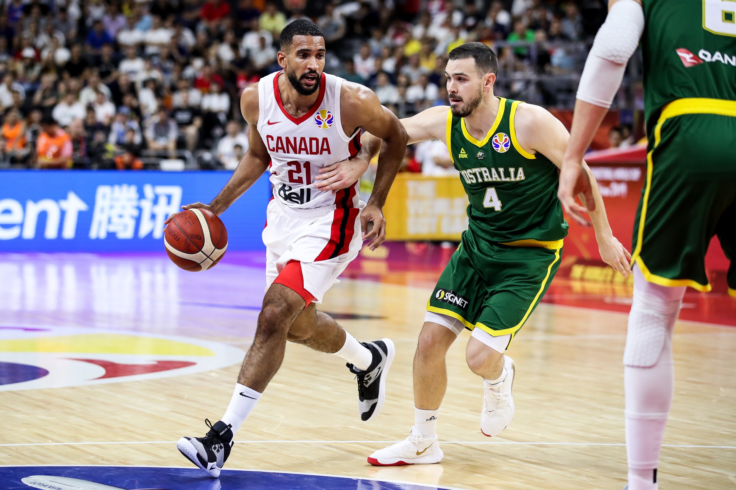 DONGGUAN, CHINA - SEPTEMBER 01: #21 Thomas Scrubb of Canada drives the ball during the 2019 FIBA World Cup, first round match between Canada and Australia at Dongguan Basketball Center on September 01, 2019 in Dongguan, China. (Photo by Zhizhao Wu/Getty I