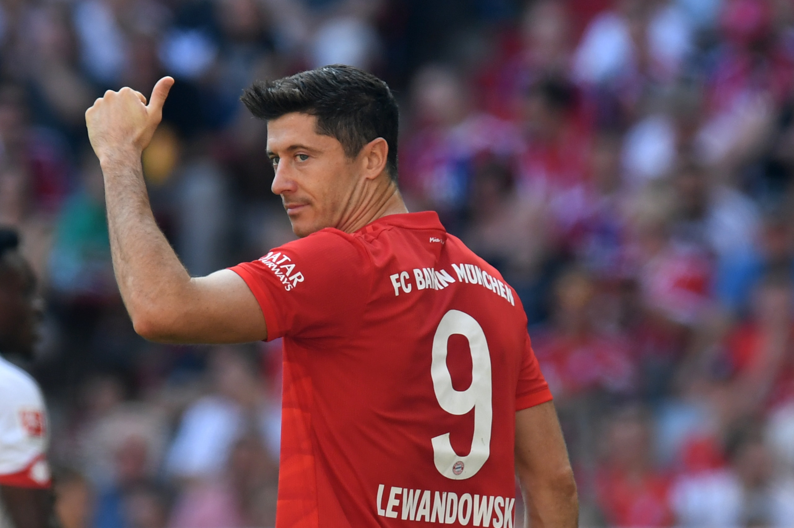 Bayern Munich's Polish forward Robert Lewandowski reacts during the German first division Bundesliga football match FC Bayern Munich versus Mainz 05 in Munich on August 31, 2019. (Photo by Christof STACHE / AFP) / RESTRICTIONS: DFL REGULATIONS PROHIBIT AN