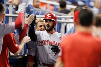 MIAMI, FLORIDA - AUGUST 28:  Eugenio Suarez #7 of the Cincinnati Reds celebrates after hitting a home run against the Miami Marlins at Marlins Park on August 28, 2019 in Miami, Florida. (Photo by Michael Reaves/Getty Images)