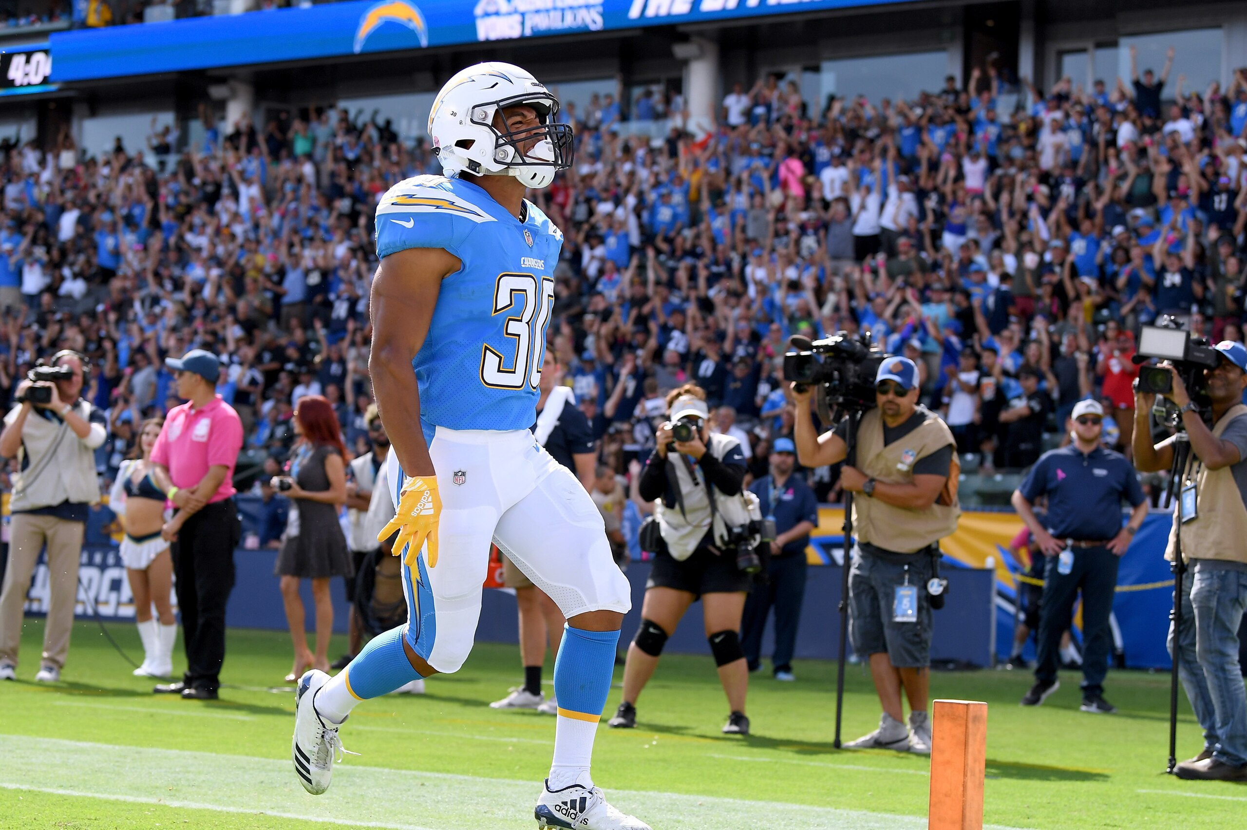 CARSON, CA - OCTOBER 07: Austin Ekeler #30 of the Los Angeles Chargers reacts to his touchdown, to take a 10-3 lead over the Oakland Raiders, during the second quarter at StubHub Center on October 7, 2018 in Carson, California. (Photo by Harry How/Getty CARSON, CA - OCTOBER 07: Austin Ekeler #30 of the Los Angeles Chargers reacts to his touchdown, to take a 10-3 lead over the Oakland Raiders, during the second quarter at StubHub Center on October 7, 2018 in Carson, California. (Photo by Harry How/Getty