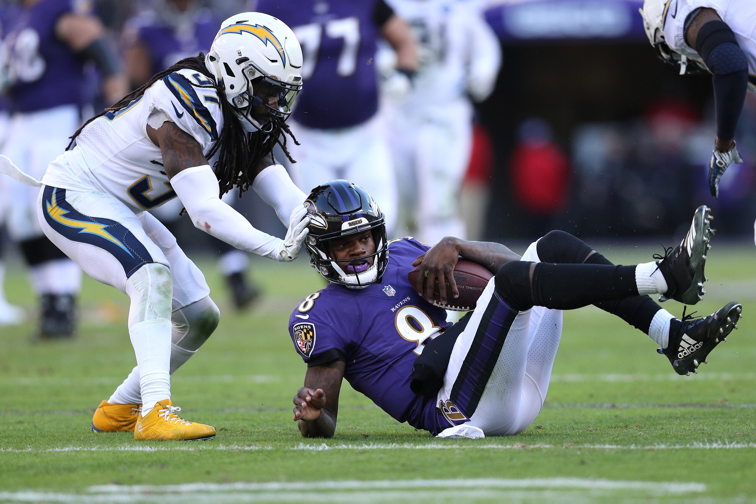 BALTIMORE, MARYLAND - JANUARY 06: Quarterback Lamar Jackson #8 of the Baltimore Ravens in action against the Los Angeles Chargers during the AFC Wild Card Playoff game at M&T Bank Stadium on January 06, 2019 in Baltimore, Maryland. (Photo by Patrick Smith BALTIMORE, MARYLAND - JANUARY 06: Quarterback Lamar Jackson #8 of the Baltimore Ravens in action against the Los Angeles Chargers during the AFC Wild Card Playoff game at M&T Bank Stadium on January 06, 2019 in Baltimore, Maryland. (Photo by Patrick Smith