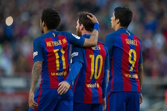 BARCELONA, SPAIN - MAY 06:  Lionel Messi of FC Barcelona celebrates with Neymar and Luis Suarez after scoring his team's 3rd goal from the penalty spot during of the La Liga match between FC Barcelona and Villarreal CF at Camp Nou stadium on May 6, 2017 i