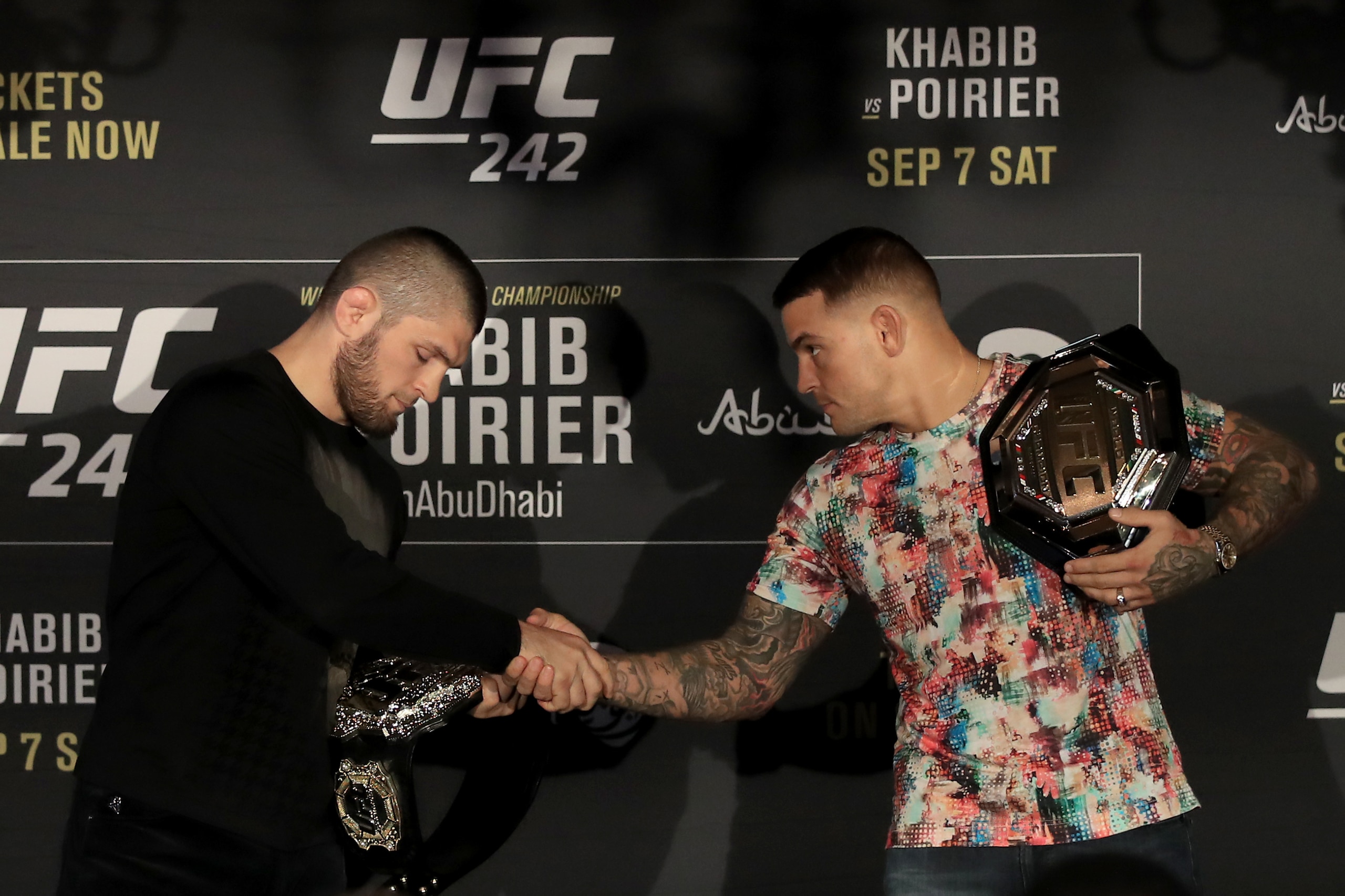 LONDON, ENGLAND - JUNE 12: Khabib Nurmagomedov and Dustin Poirier shake hands during a UFC 242 Press Conference at Hotel Cafe Royal on June 12, 2019 in London, England. (Photo by Marc Atkins/Zuffa LLC/Zuffa LLC)