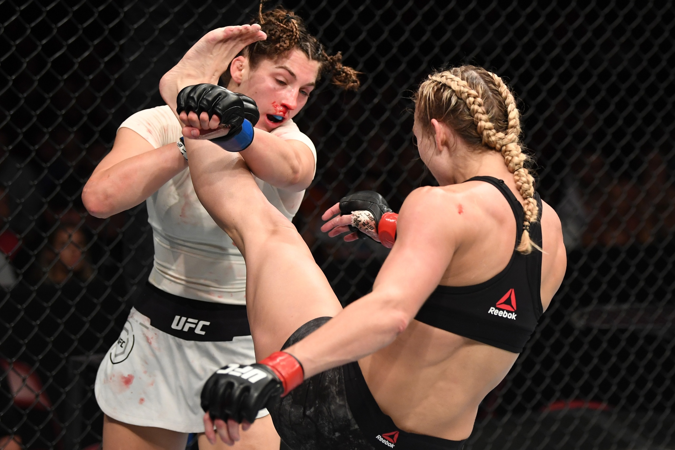 GREENVILLE, SC - JUNE 22:  (R-L) Andrea Lee kicks Montana De La Rosa in their women's flyweight bout during the UFC Fight Night event at Bon Secours Wellness Arena on June 22, 2019 in Greenville, South Carolina. (Photo by Josh Hedges/Zuffa LLC/Zuffa LLC v