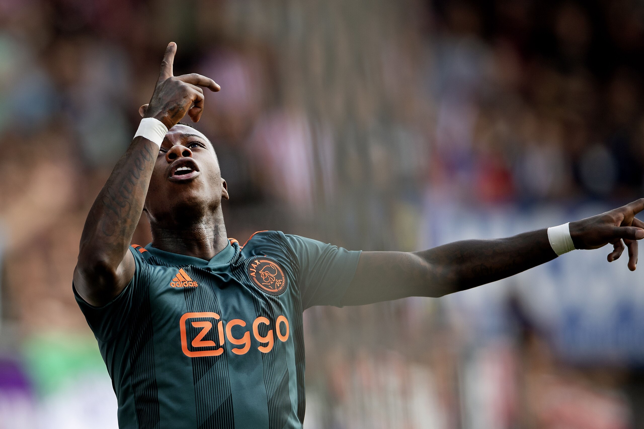 Ajax's Dutch forward Quincy Promes celebrates his goal against Sparta in the Eredivisie football match, Sparta Rotterdam against Ajax in Rotterdam on September 1, 2019. (Photo by Olaf KRAAK / ANP / AFP) / Netherlands OUT        (Photo credit should read O