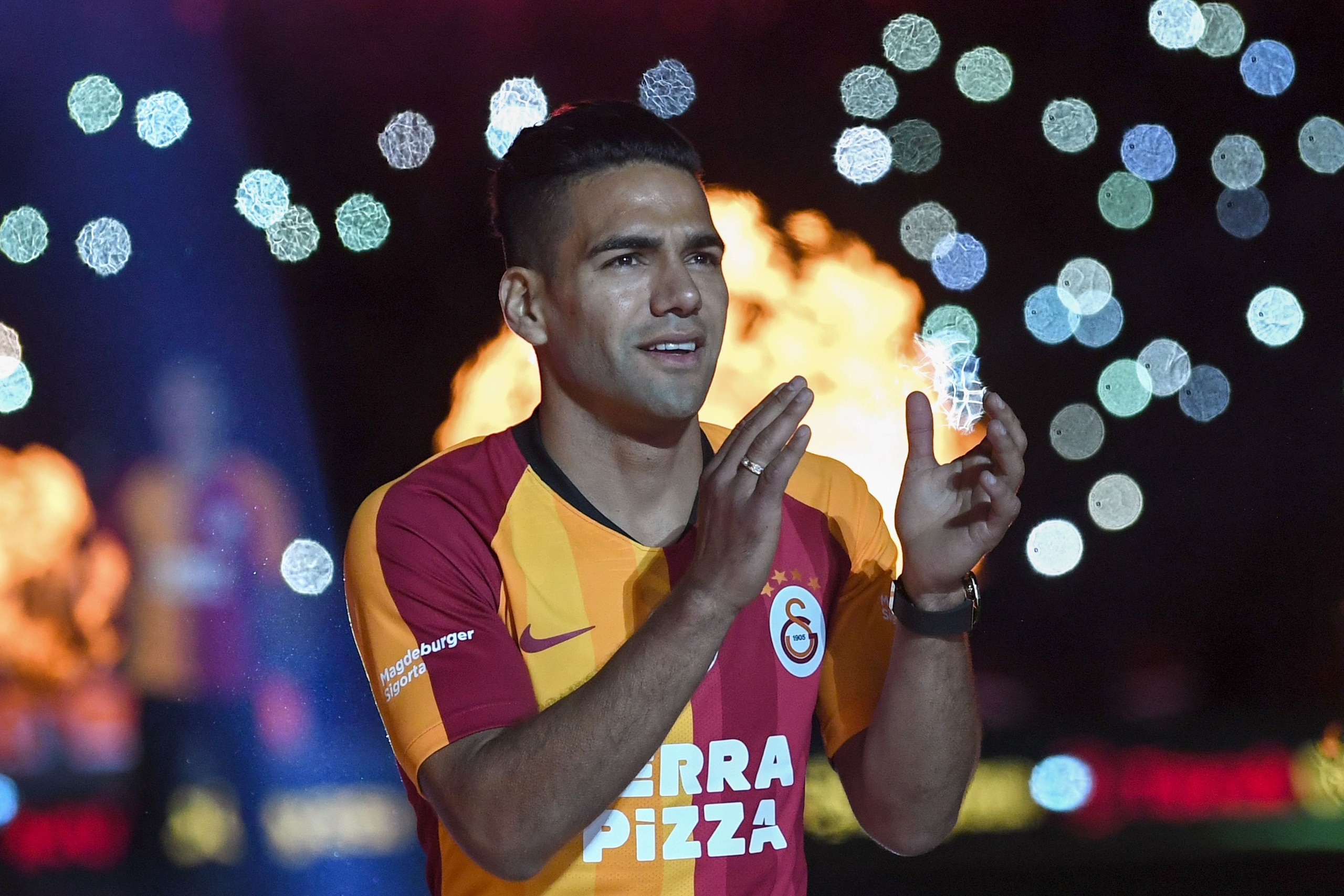 Galatasaray FC presents Colombian striker Radamel Falcao salutes fans during a signing cerenomy for their new transfers at TT Arena stadium in Istanbul on September 4, 2019. - Galatasaray confirmed the signing of veteran Colombian striker Radamel Falcao f