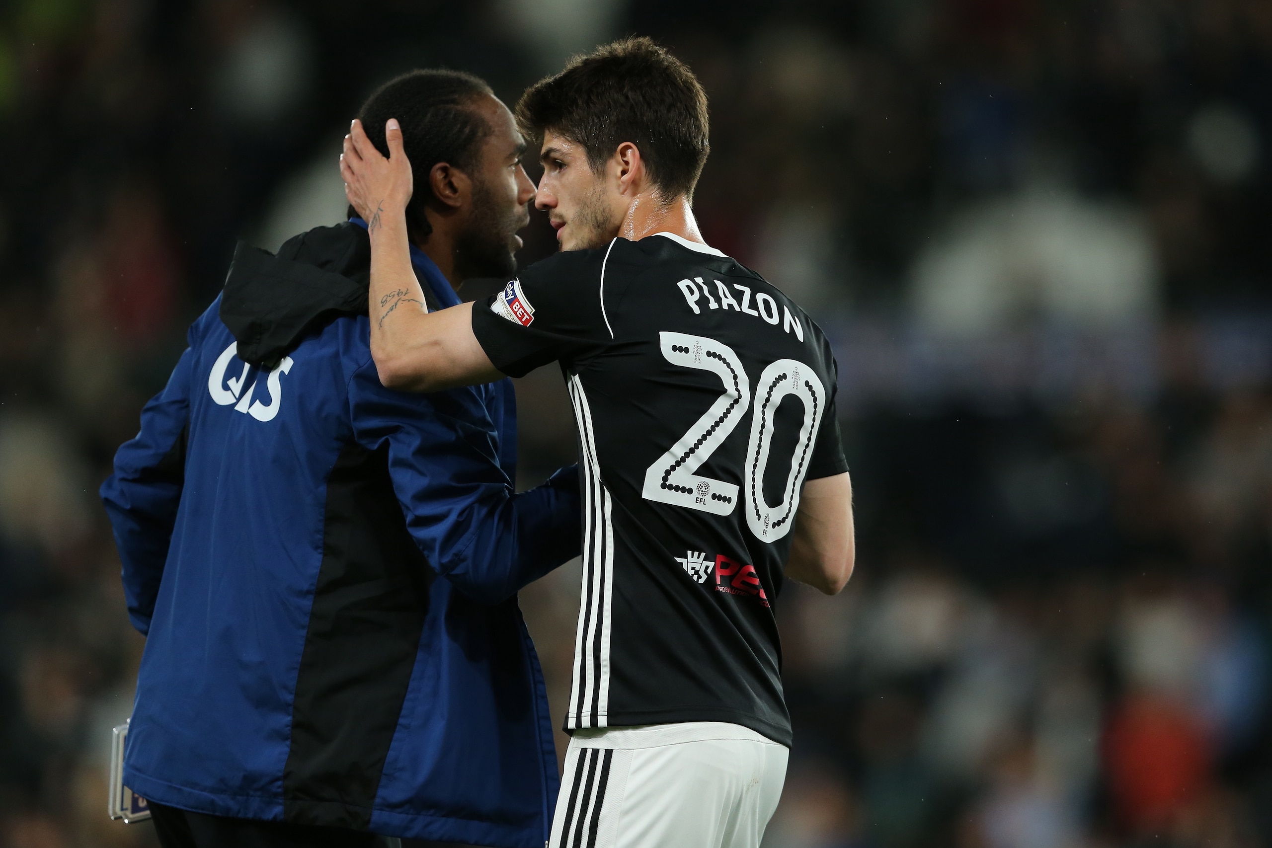 DERBY, ENGLAND - MAY 11: Cameron Jerome of Derby County and Lucas Piazon of Fulham during the Sky Bet Championship Play Off Semi Final:First Leg match between Derby County and Fulham at iPro Stadium on May 11, 2018 in Derby, England. (Photo by James Willi