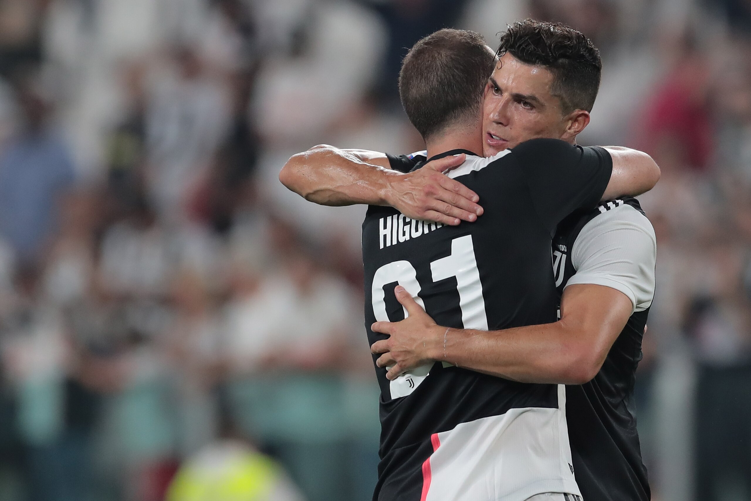 TURIN, ITALY - AUGUST 31:  Cristiano Ronaldo of Juventus celebrates his goal with his team-mate Gonzalo Higuain during the Serie A match between Juventus and SSC Napoli at Allianz Stadium on August 31, 2019 in Turin, Italy.  (Photo by Emilio Andreoli/Gett