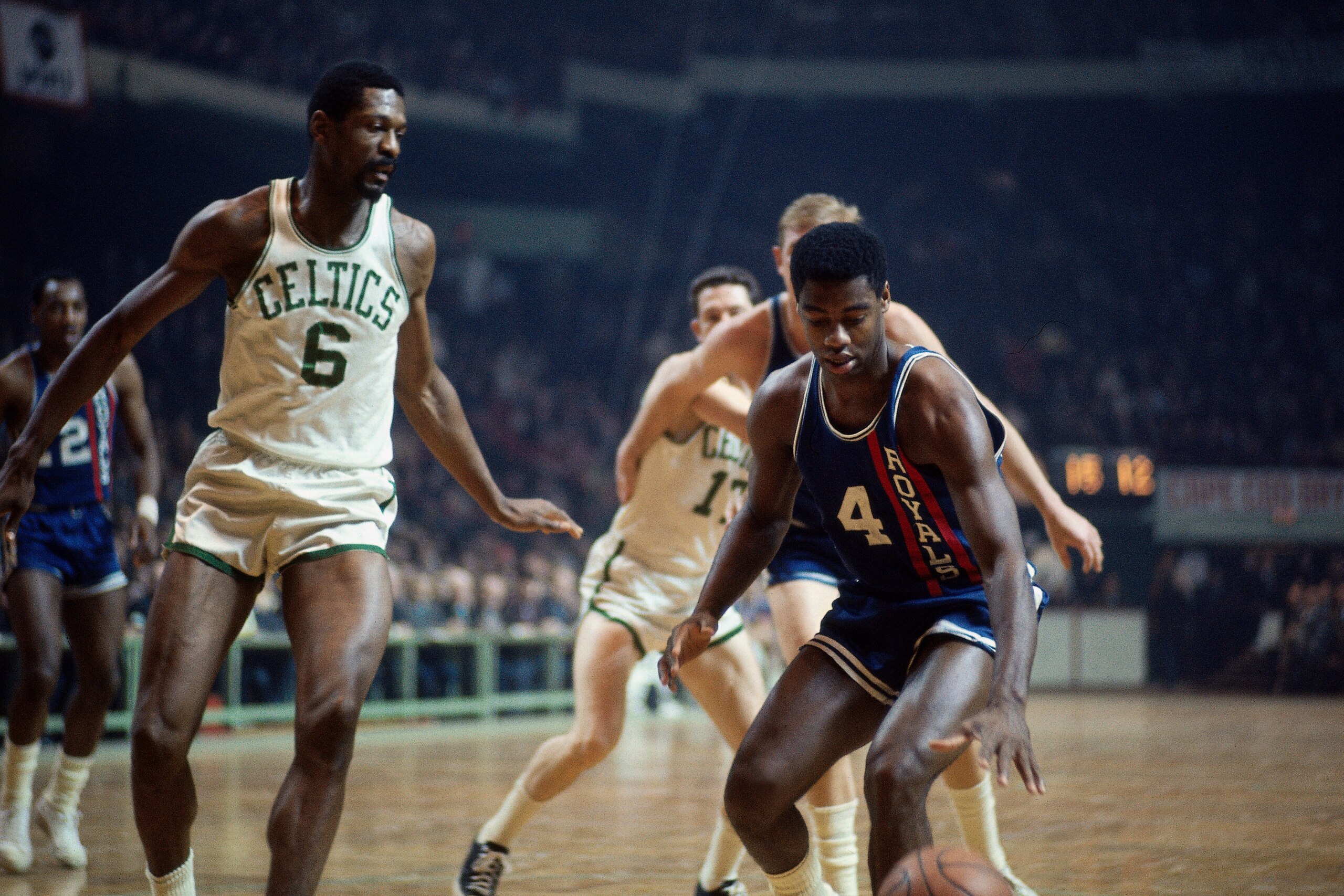 BOSTON, MA - 1968: Oscar Robertson #14 of the Cincinnati Royals handles the ball against the Boston Celtics circa 1968 at the Boston Garden in Boston, Massachusetts. NOTE TO USER: User expressly acknowledges and agrees that, by downloading and/or using th