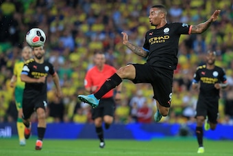 Manchester City's Brazilian striker Gabriel Jesus jumps to control the ball during the English Premier League football match between Norwich City and Manchester City at Carrow Road in Norwich, eastern England on September 14, 2019. (Photo by Lindsey Parna