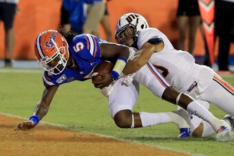 GAINESVILLE, FLORIDA - SEPTEMBER 07: Emory Jones #5 of the Florida Gators crosses the goal line for a touchdown during the game against the Tennessee Martin Skyhawks at Ben Hill Griffin Stadium on September 07, 2019 in Gainesville, Florida. (Photo by Sam 