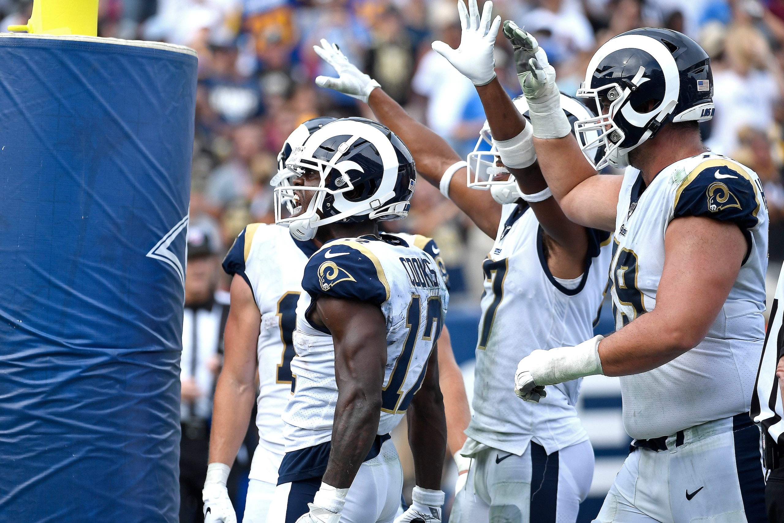 LOS ANGELES, CALIFORNIA - SEPTEMBER 15:  Brandin Cooks #12 of the Los Angeles Rams celebrates his third quarter touchdown reception with his teammates against the New Orleans Saints at Los Angeles Memorial Coliseum on September 15, 2019 in Los Angeles, Ca