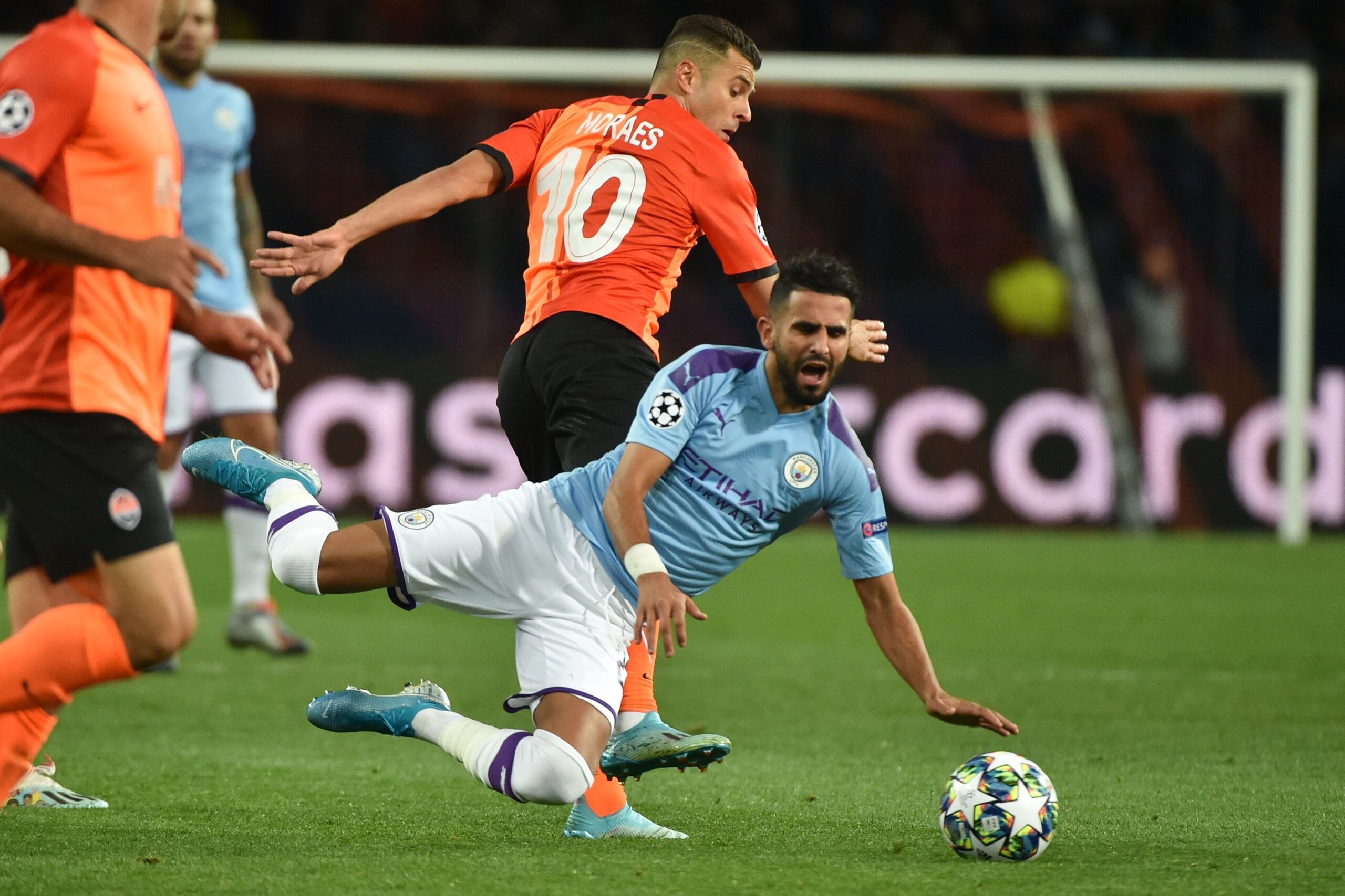 Shakhtar Donetsk's Ukrainian forward Junior Moraes and Manchester City's Algerian midfielder Riyad Mahrez in action during the UEFA Champions League Group C football match between FC Shakhtar Donetsk and Manchester City FC at the OSK Metalist stadium in K
