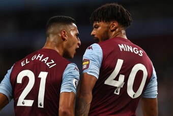 BIRMINGHAM, ENGLAND - SEPTEMBER 16: Tyrone Mings (r) and Anwar El Ghazi of Aston Villa square upto each other during the Premier League match between Aston Villa and West Ham United at Villa Park on September 16, 2019 in Birmingham, United Kingdom. (Photo