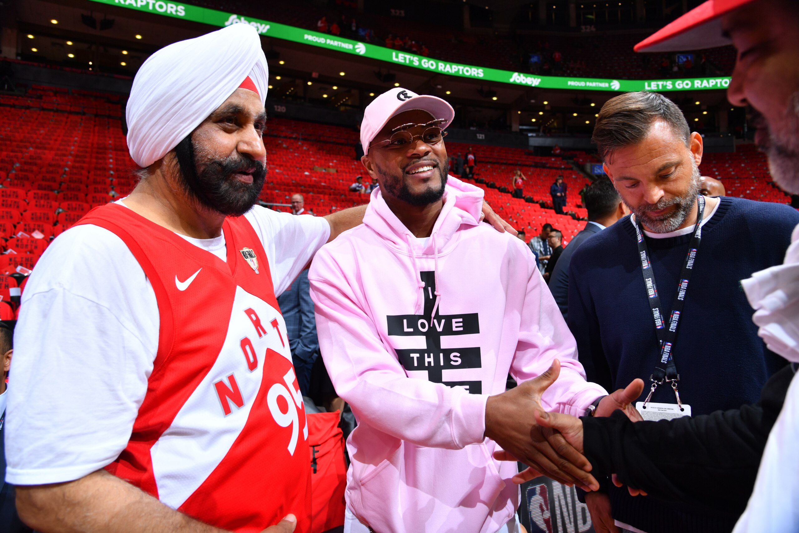 TORONTO, CANADA - JUNE 10: Toronto Raptors superfan Nav Bhatia and Soccer legend Patrice Evra attend Game Five of the NBA Finals against the Golden State Warriors on June 10, 2019 at Scotiabank Arena in Toronto, Ontario, Canada. NOTE TO USER: User express TORONTO, CANADA - JUNE 10: Toronto Raptors superfan Nav Bhatia and Soccer legend Patrice Evra attend Game Five of the NBA Finals against the Golden State Warriors on June 10, 2019 at Scotiabank Arena in Toronto, Ontario, Canada. NOTE TO USER: User express