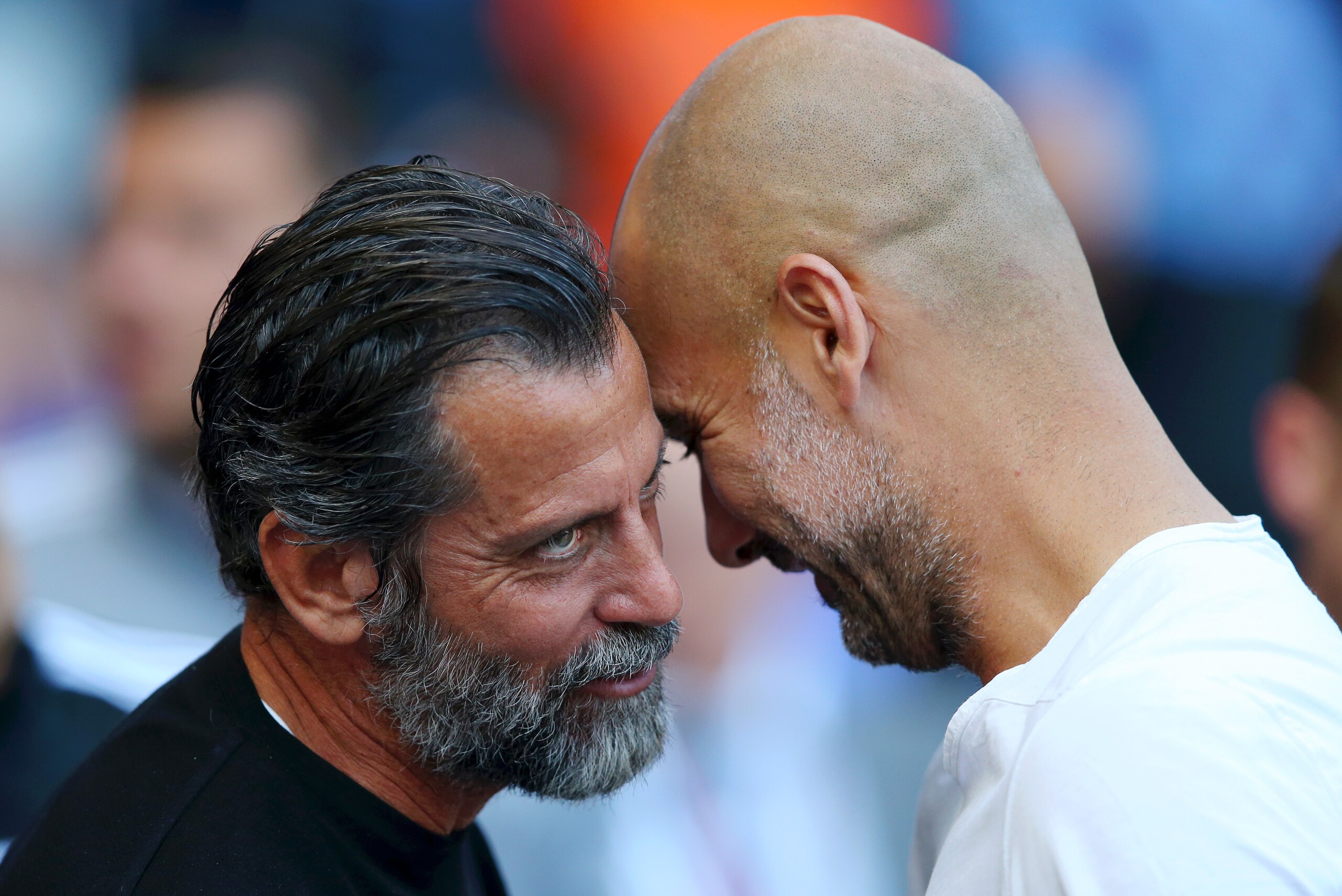 MANCHESTER, ENGLAND - SEPTEMBER 21:  Quique Sanchez Flores, Manager of Watford and Pep Guardiola, Manager of Manchester City in discussion prior to the Premier League match between Manchester City and Watford FC at Etihad Stadium on September 21, 2019 in 