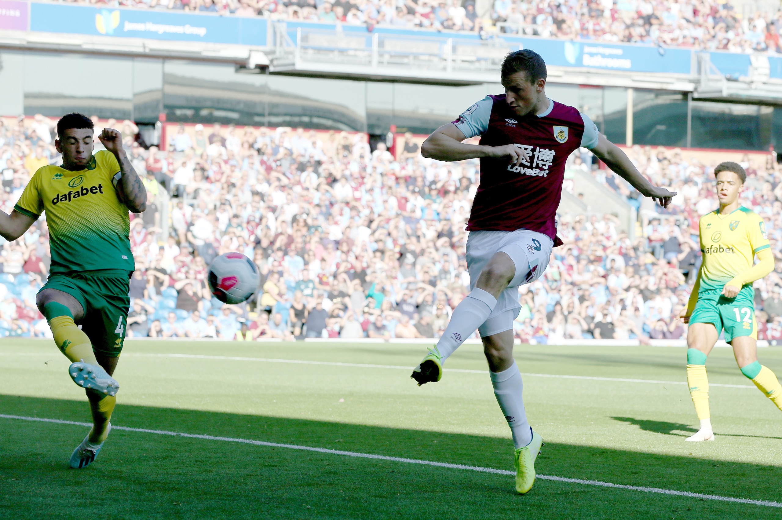 BURNLEY, ENGLAND - SEPTEMBER 21: Chris Wood of Burnley scores his teams second goal during the Premier League match between Burnley FC and Norwich City at Turf Moor on September 21, 2019 in Burnley, United Kingdom. (Photo by Nigel Roddis/Getty Images)
