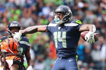 SEATTLE, WASHINGTON - SEPTEMBER 08: D.K. Metcalf #14 of the Seattle Seahawks celebrates after making a catch in the third quarter against the Cincinnati Bengals during their game at CenturyLink Field on September 08, 2019 in Seattle, Washington. (Photo by