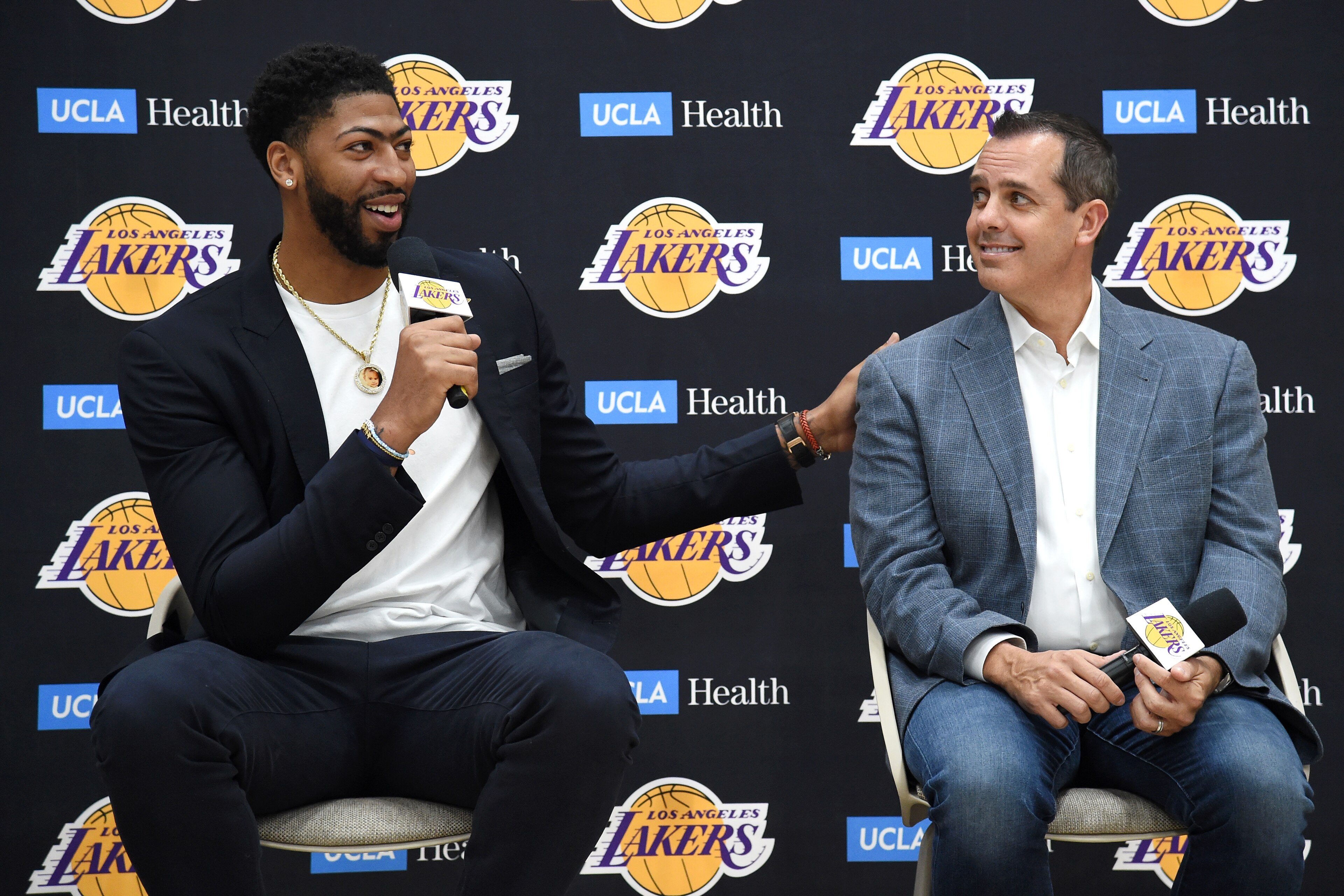EL SEGUNDO, CA - JULY 13 :  General Manager Rob Pelinka and Head Coach Frank Vogel introduce Anthony Davis #3 of the Los Angeles Lakers during a press conference on July 13, 2019 at the UCLA Health Training Center in El Segundo, California. NOTE TO USER: