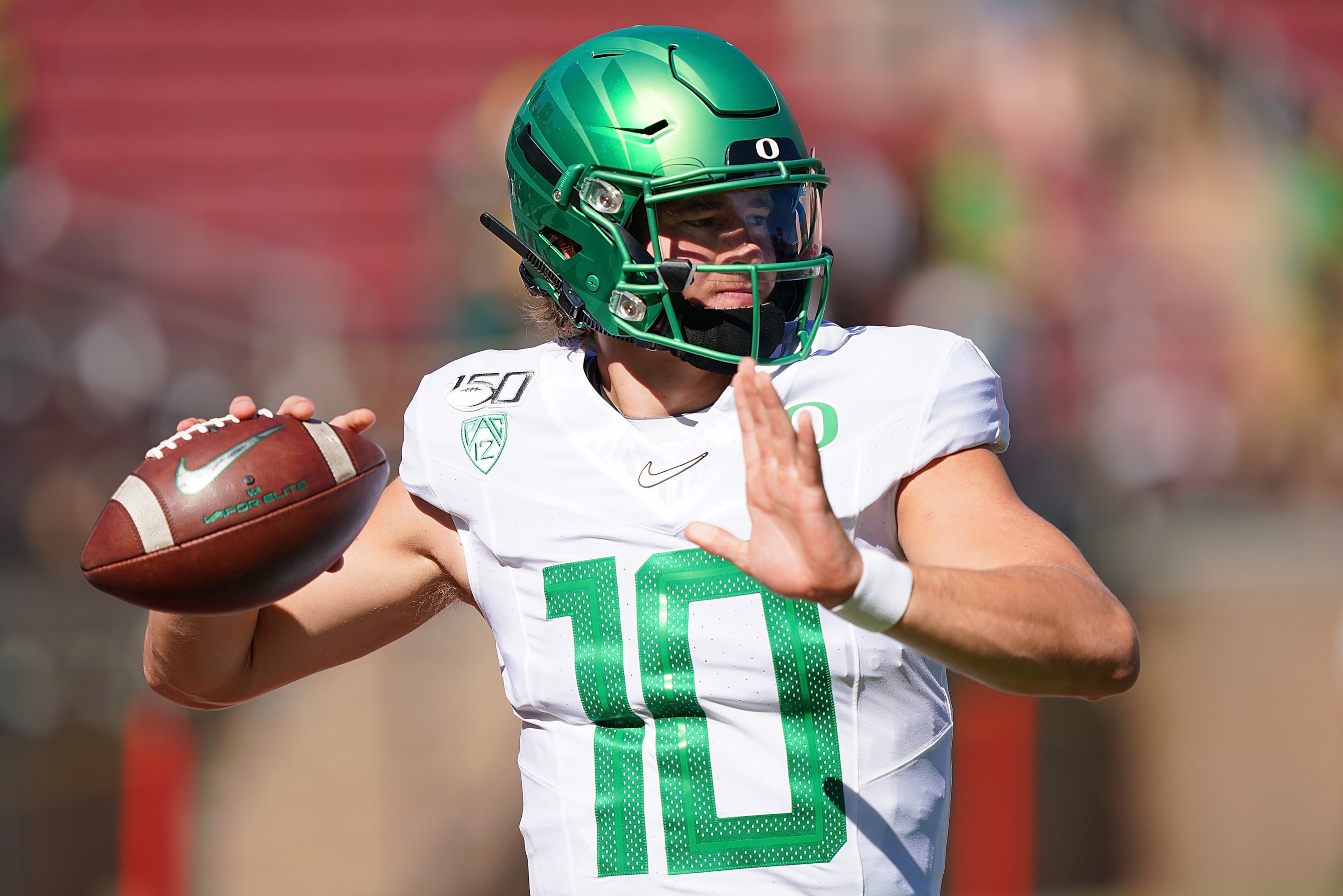 PALO ALTO, CA - SEPTEMBER 21: Justin Herbert #10 of the Oregon Ducks warms up during pregame warm ups prior to the start of an NCAA football game against the Stanford Cardinal at Stanford Stadium on September 21, 2019 in Palo Alto, California. (Photo by PALO ALTO, CA - SEPTEMBER 21: Justin Herbert #10 of the Oregon Ducks warms up during pregame warm ups prior to the start of an NCAA football game against the Stanford Cardinal at Stanford Stadium on September 21, 2019 in Palo Alto, California. (Photo by