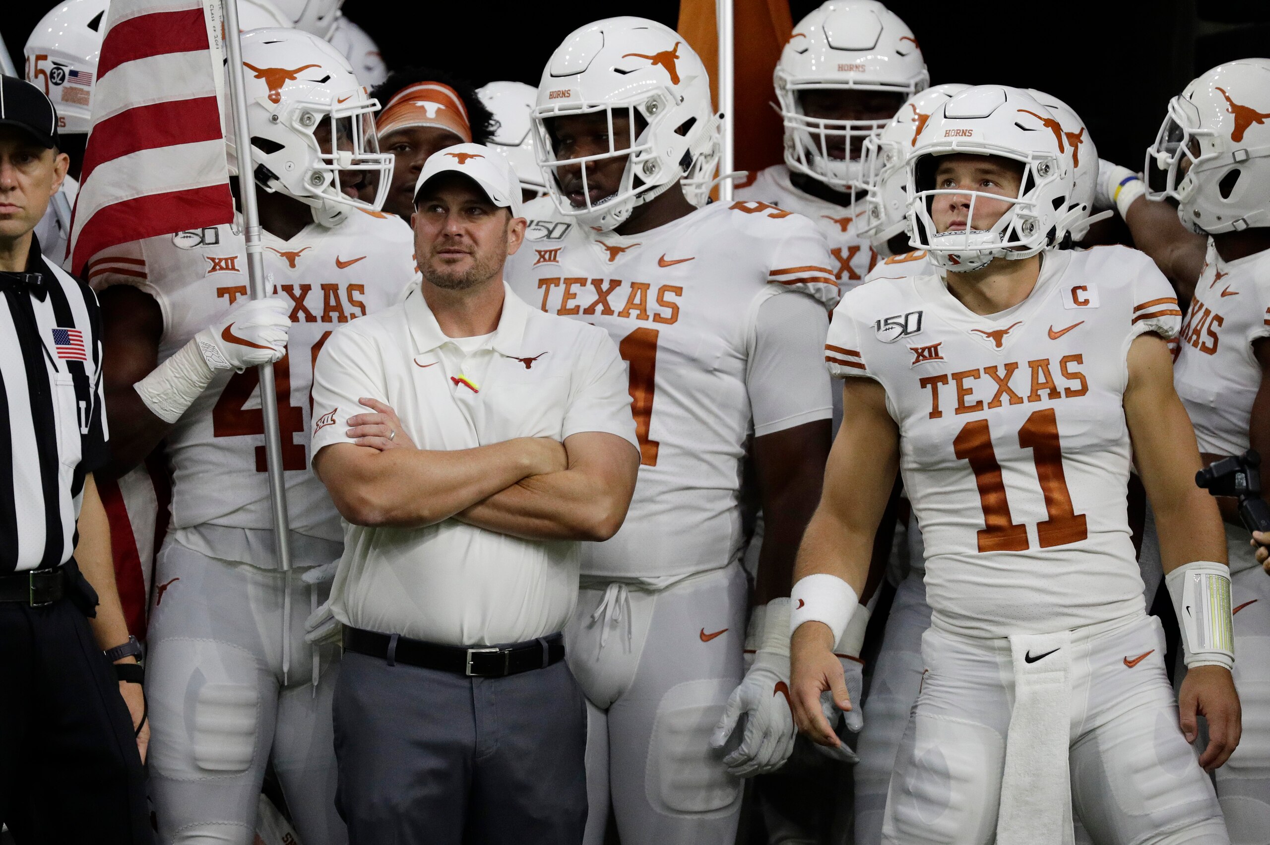 Texas QB Sam Ehlinger (11) and head coach Tom Herman Texas QB Sam Ehlinger (11) and head coach Tom Herman