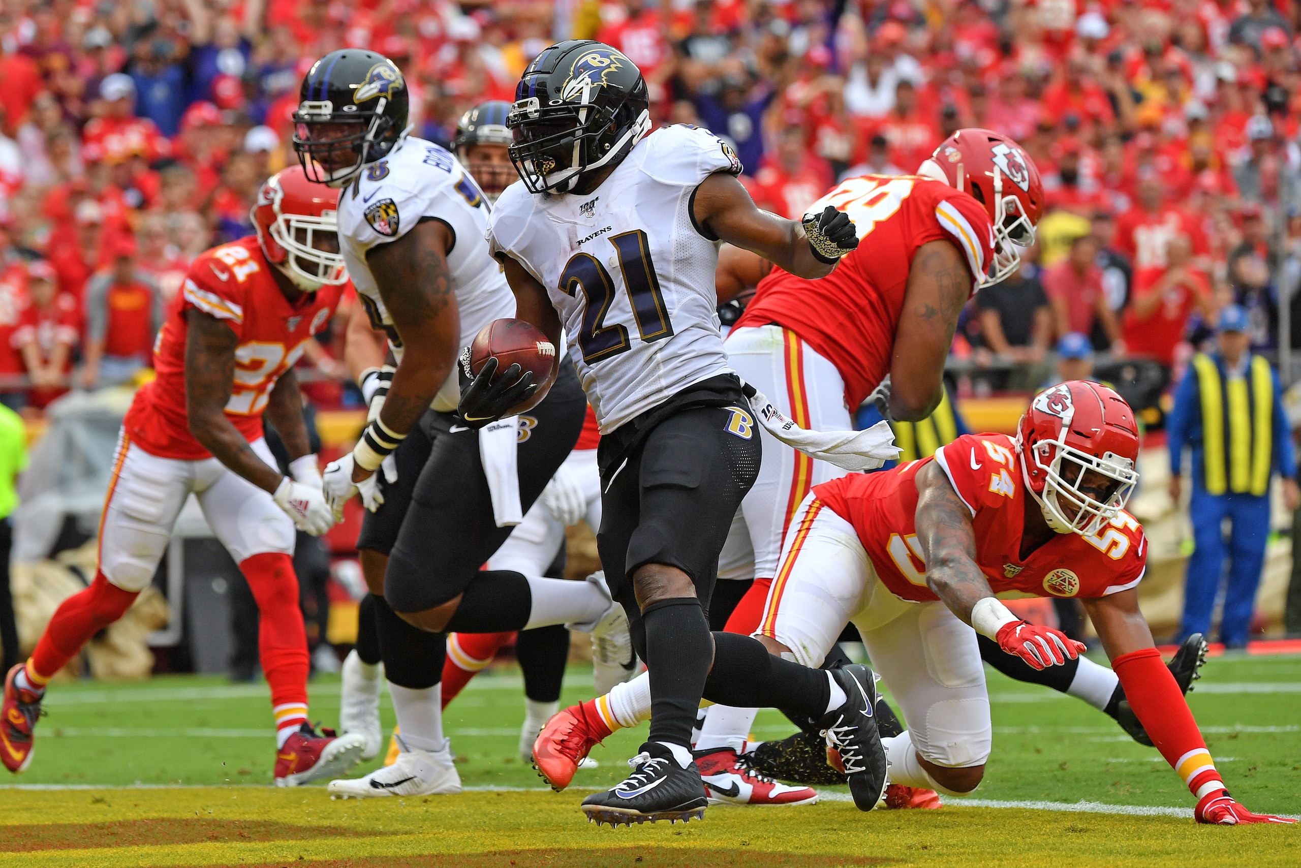 KANSAS CITY, MO - SEPTEMBER 22:  Running back Mark Ingram #21 of the Baltimore Ravens rushes into the end zone for a touchdown against the Kansas City Chiefs during the first half at Arrowhead Stadium on September 22, 2019 in Kansas City, Missouri. (Photo