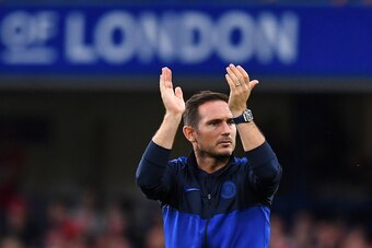 Chelsea's English head coach Frank Lampard applauds supporters on the pitch after the English Premier League football match between Chelsea and Liverpool at Stamford Bridge in London on September 22, 2019. - Liverpool won the game 2-1. (Photo by Ben STANS