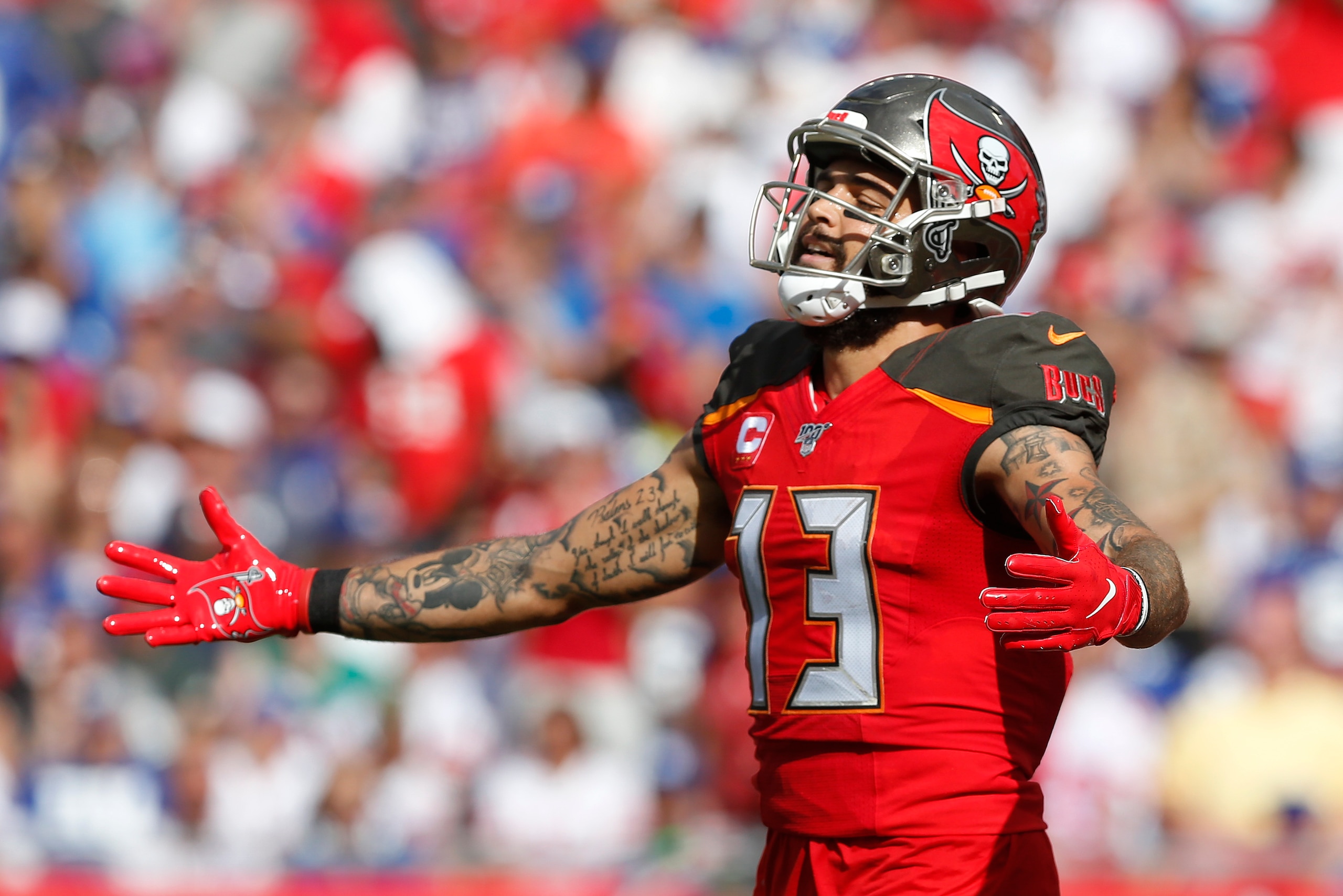 TAMPA, FLORIDA - SEPTEMBER 22: Wide receiver Mike Evans #13 of the Tampa Bay Buccaneers celebrates after a first quarter touchdown during the game against the New York Giants at Raymond James Stadium on September 22, 2019 in Tampa, Florida. (Photo by Mike
