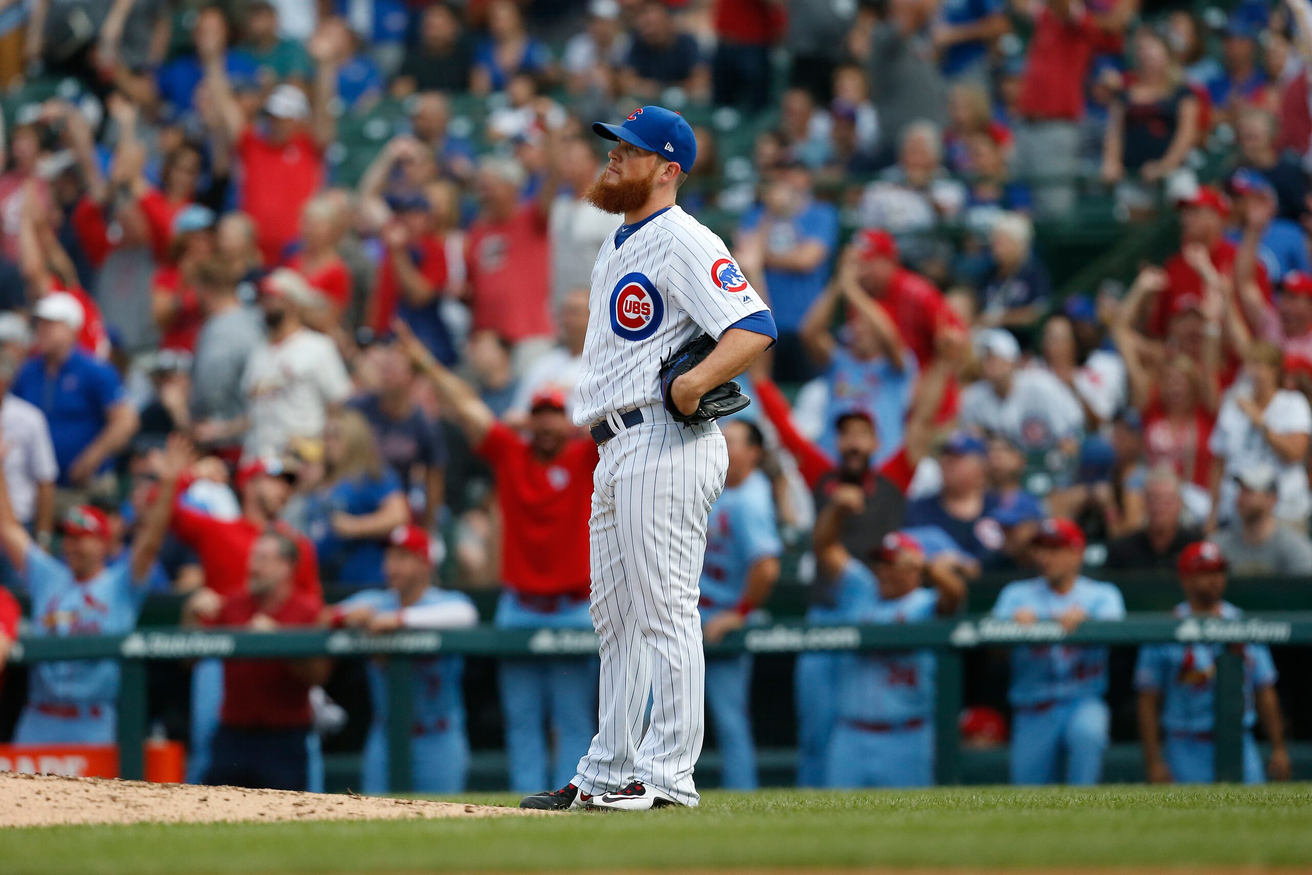 CHICAGO, ILLINOIS - SEPTEMBER 21: Craig Kimbrel #24 of the Chicago Cubs watches the flight of the home run hit by Paul DeJong #12 of the St. Louis Cardinals during the ninth inning of a game at Wrigley Field on September 21, 2019 in Chicago, Illinois. (Ph CHICAGO, ILLINOIS - SEPTEMBER 21: Craig Kimbrel #24 of the Chicago Cubs watches the flight of the home run hit by Paul DeJong #12 of the St. Louis Cardinals during the ninth inning of a game at Wrigley Field on September 21, 2019 in Chicago, Illinois. (Ph