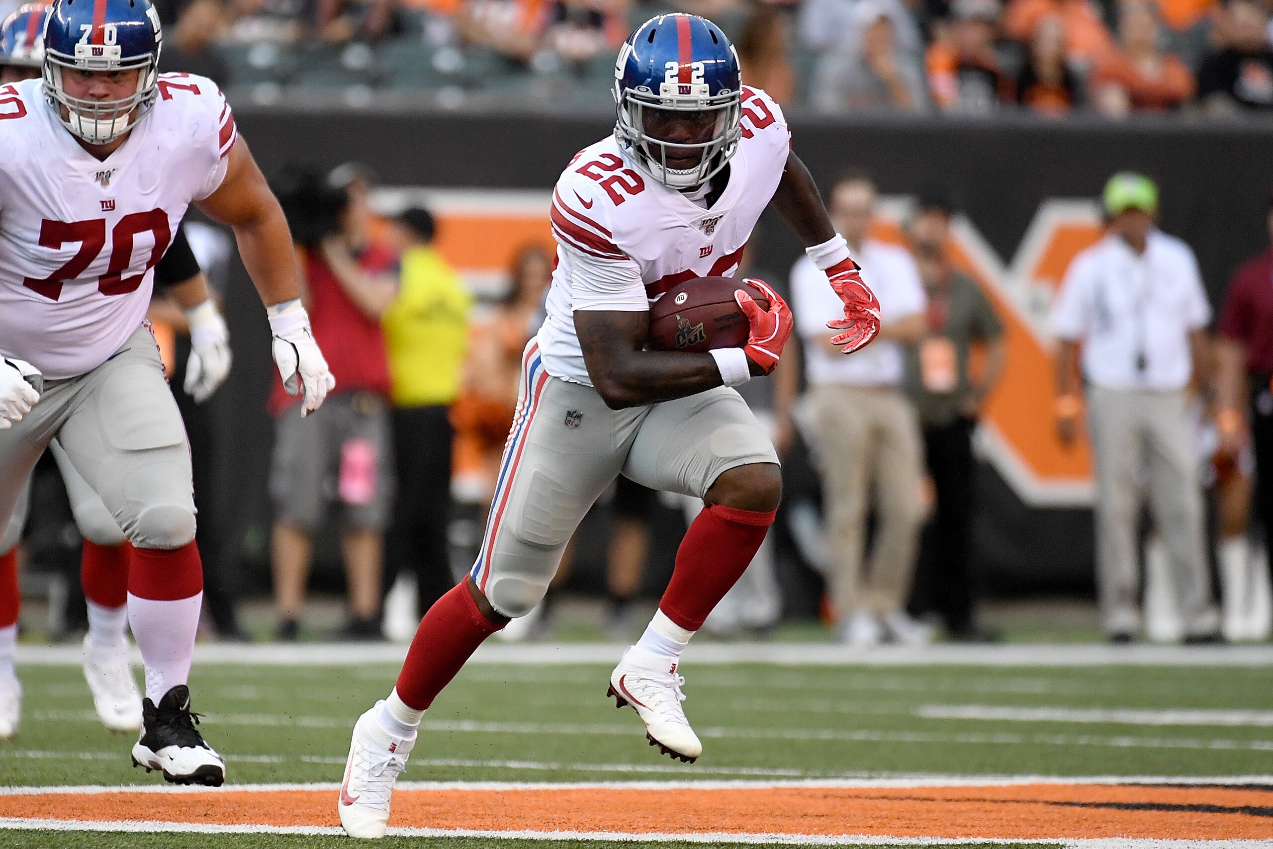 CINCINNATI, OH - AUGUST 22: Wayne Gallman #22 of the New York Giants runs the ball downfield after making catch in the first quarter of the preseason game against the Cincinnati Bengals at Paul Brown Stadium on August 22, 2019 in Cincinnati, Ohio. (Photo CINCINNATI, OH - AUGUST 22: Wayne Gallman #22 of the New York Giants runs the ball downfield after making catch in the first quarter of the preseason game against the Cincinnati Bengals at Paul Brown Stadium on August 22, 2019 in Cincinnati, Ohio. (Photo