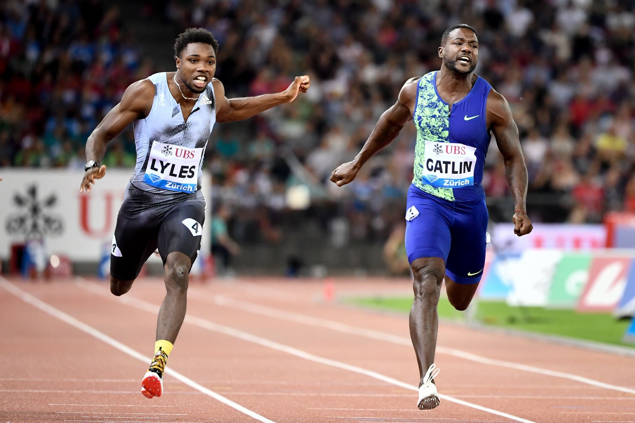 US Noah Lyles (L) and US Justin Gatlin compete in the Men 100m during the IAAF Diamond League competition on August 29, 2019, in Zurich. (Photo by FABRICE COFFRINI / AFP)        (Photo credit should read FABRICE COFFRINI/AFP/Getty Images)