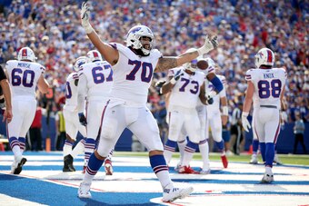 ORCHARD PARK, NEW YORK - SEPTEMBER 22: Cody Ford #70 of the Buffalo Bills celebrates after a touchdown during a game against the Cincinnati Bengals at New Era Field on September 22, 2019 in Orchard Park, New York. (Photo by Bryan M. Bennett/Getty Images)