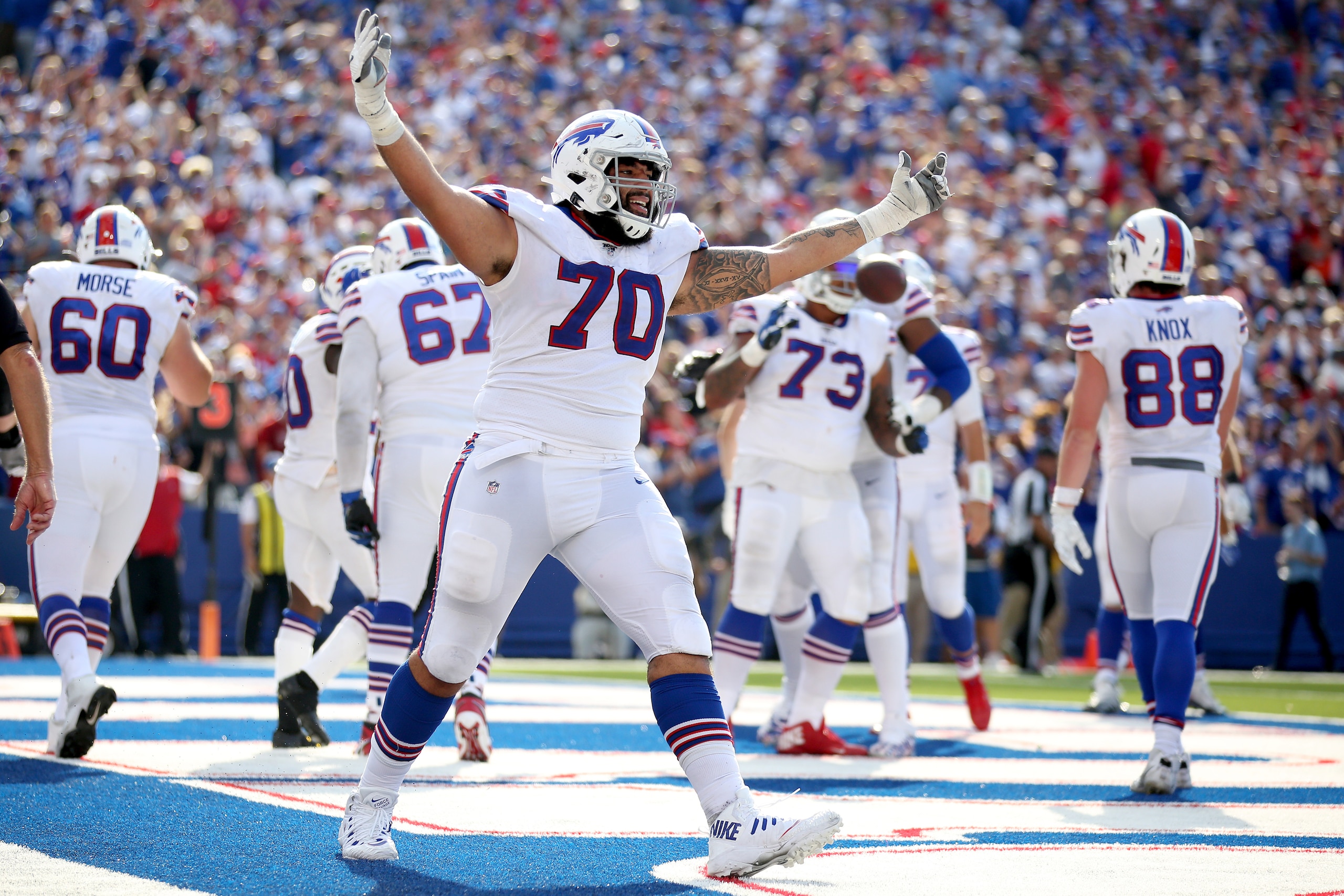 ORCHARD PARK, NEW YORK - SEPTEMBER 22: Cody Ford #70 of the Buffalo Bills celebrates after a touchdown during a game against the Cincinnati Bengals at New Era Field on September 22, 2019 in Orchard Park, New York. (Photo by Bryan M. Bennett/Getty Images)