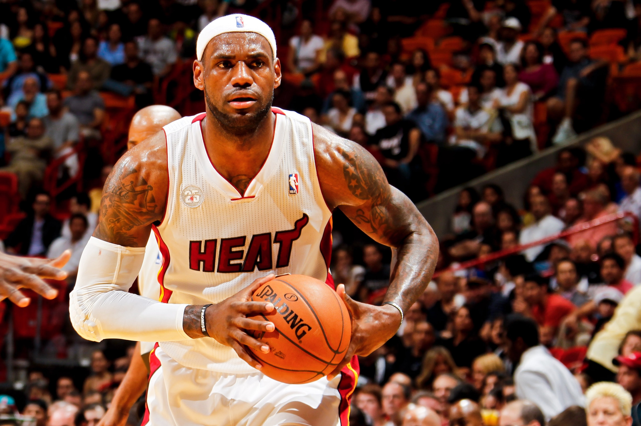 MIAMI, FL - DECEMBER 12: LeBron James #6 of the Miami Heat looks to pass the ball against the Golden State Warriors on December 12, 2012 at American Airlines Arena in Miami, Florida. NOTE TO USER: User expressly acknowledges and agrees that, by downloadin