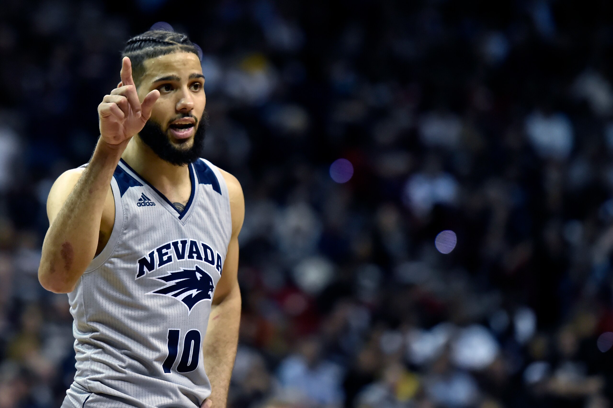 LAS VEGAS, NEVADA - MARCH 15: Caleb Martin #10 of the Nevada Wolf Pack gestures during a semifinal game of the Mountain West Conference basketball tournament against the San Diego State Aztecs at the Thomas & Mack Center on March 15, 2019 in Las Vegas, N LAS VEGAS, NEVADA - MARCH 15: Caleb Martin #10 of the Nevada Wolf Pack gestures during a semifinal game of the Mountain West Conference basketball tournament against the San Diego State Aztecs at the Thomas & Mack Center on March 15, 2019 in Las Vegas, N