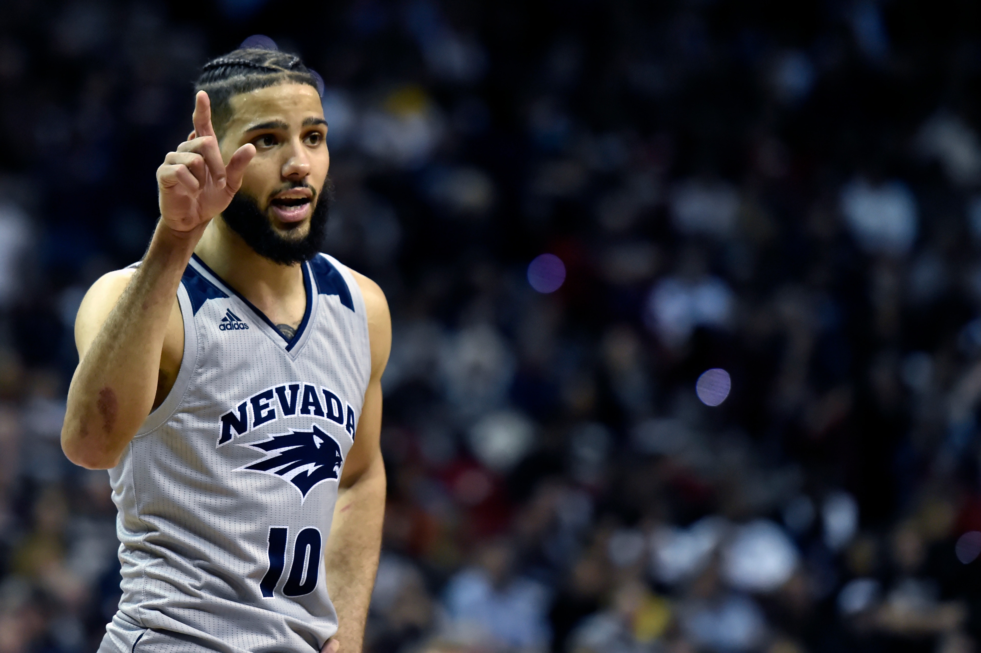 LAS VEGAS, NEVADA - MARCH 15:  Caleb Martin #10 of the Nevada Wolf Pack gestures during a semifinal game of the Mountain West Conference basketball tournament against the San Diego State Aztecs at the Thomas & Mack Center on March 15, 2019 in Las Vegas, N