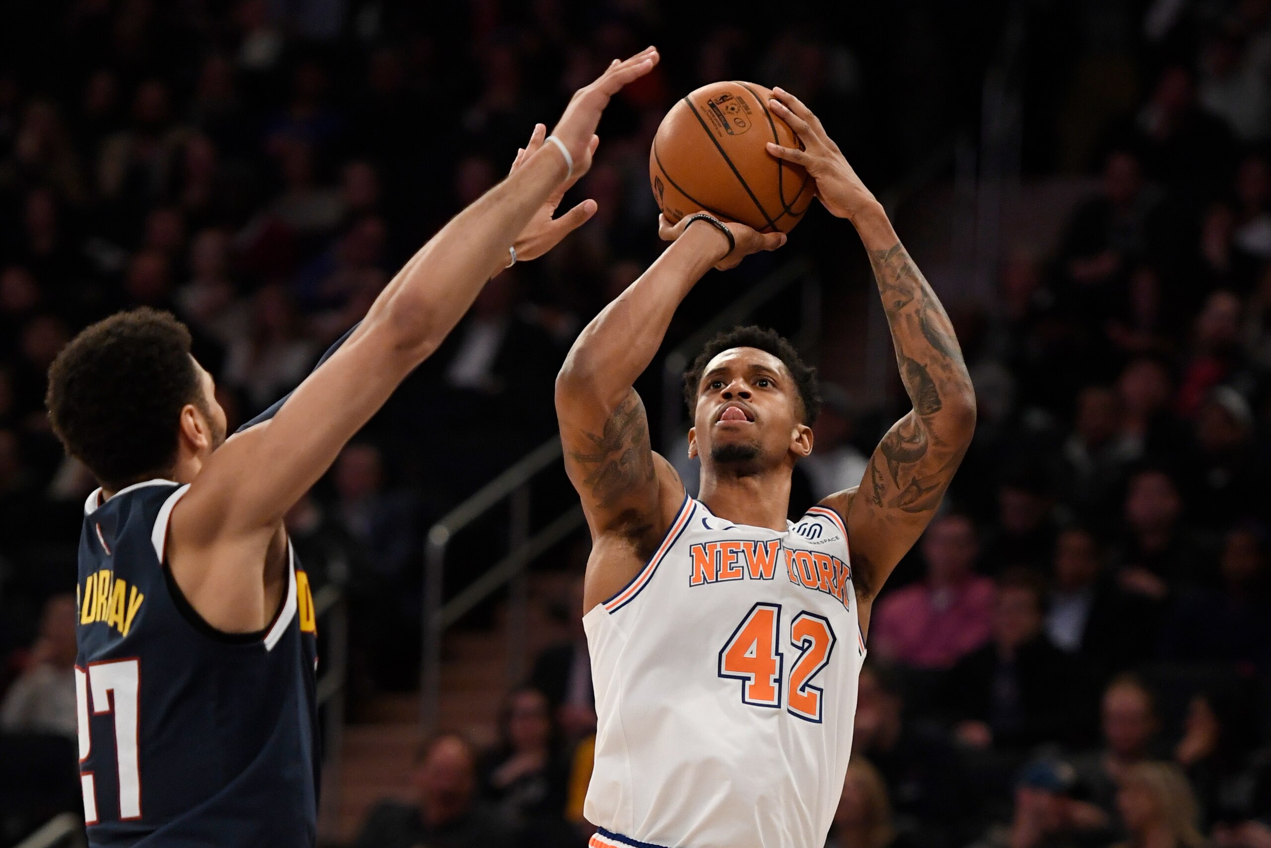 NEW YORK, NEW YORK - MARCH 22: Lance Thomas #42 of the New York Knicks attempts a basket during the second half of the game against the Denver Nuggets at Madison Square Garden on March 22, 2019 in New York City. NOTE TO USER: User expressly acknowledges a