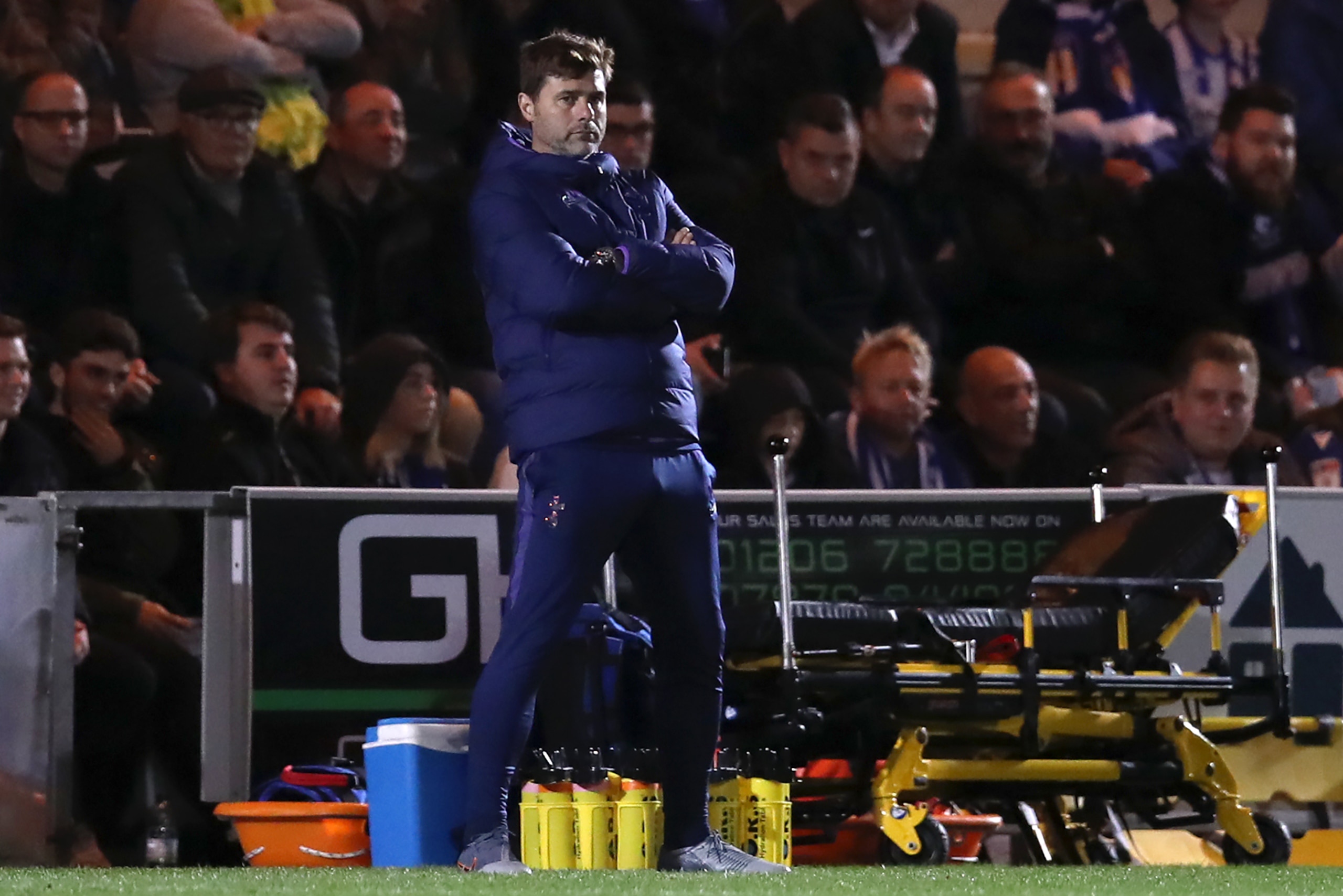 Tottenham Hotspur's Argentinian head coach Mauricio Pochettino reacts during the English League Cup third round football match between Colchester United and Tottenham Hotspur at the Colchester Community stadium in Colchester, eastern England, on September