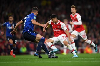 LONDON, ENGLAND - SEPTEMBER 24:  Gabriel Martinelli of Arsenal runs at Tobias Figueiredo of Nottingham Forest during the Carabao Cup Third Round match between Arsenal FC and Nottingham Forrest at Emirates Stadium on September 24, 2019 in London, England. 