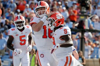 Trevor Lawrence (16), Travis Etienne (9) and Tee Higgins (5)