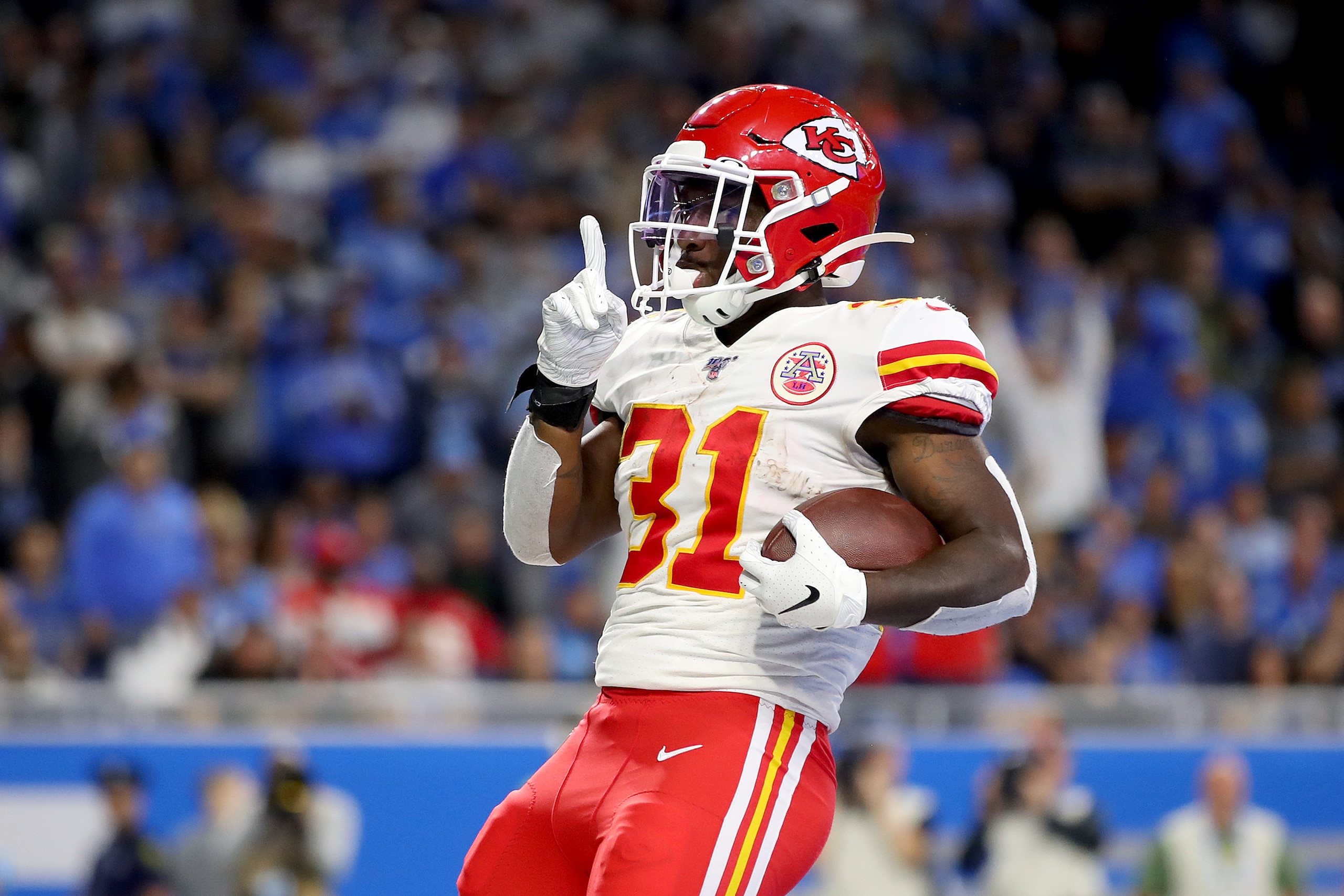 DETROIT, MICHIGAN - SEPTEMBER 29: Darrel Williams #31 of the Kansas City Chiefs celebrates after scoring a 1 yard touchdown against the Detroit Lions during the fourth quarter in the game at Ford Field on September 29, 2019 in Detroit, Michigan. (Photo by