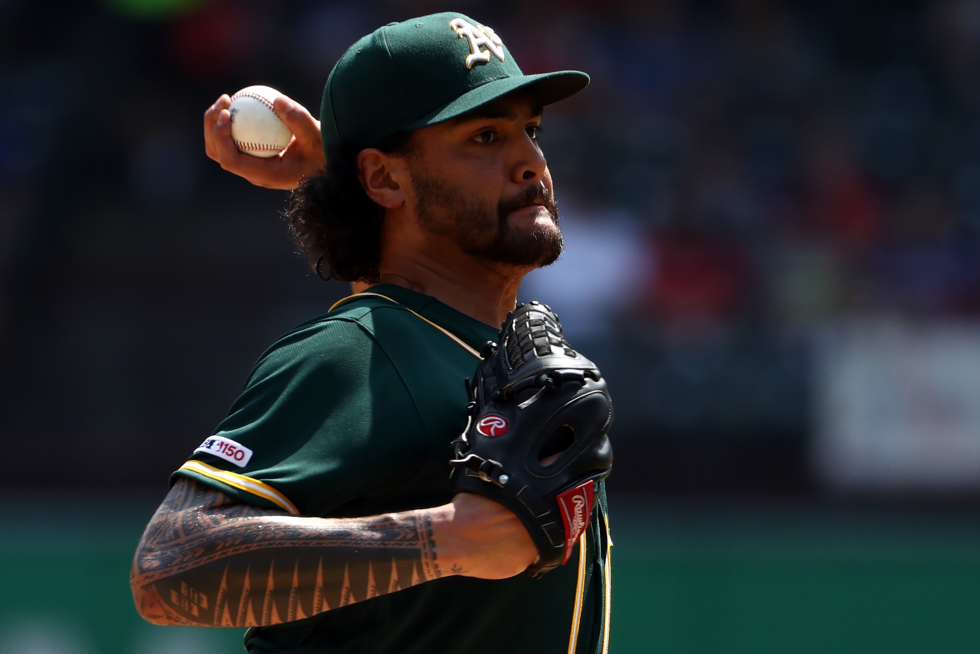 ARLINGTON, TEXAS - SEPTEMBER 15: Sean Manaea #55 of the Oakland Athletics throws against the Texas Rangers in the first inning at Globe Life Park in Arlington on September 15, 2019 in Arlington, Texas. (Photo by Ronald Martinez/Getty Images) ARLINGTON, TEXAS - SEPTEMBER 15: Sean Manaea #55 of the Oakland Athletics throws against the Texas Rangers in the first inning at Globe Life Park in Arlington on September 15, 2019 in Arlington, Texas. (Photo by Ronald Martinez/Getty Images)
