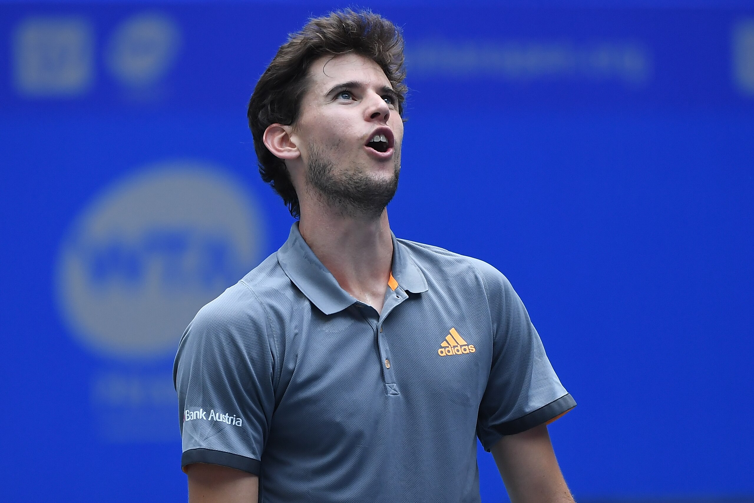 WUHAN, CHINA - SEPTEMBER 28:  Dominic Thiem of Austria reacts during the men's exhibition match against Fabio Fognini of Italy on Day 7 of 2019 Dongfeng Motor Wuhan Open at Optics Valley International Tennis Center on September 28, 2019 in Wuhan, China.  