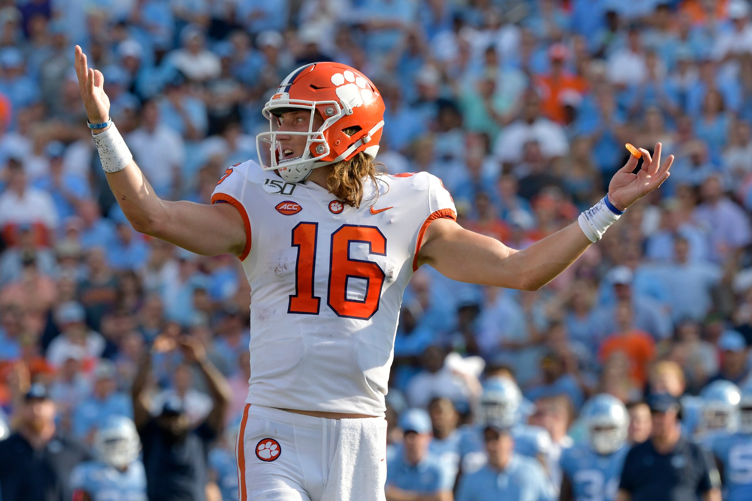 CHAPEL HILL, NORTH CAROLINA - SEPTEMBER 28: Trevor Lawrence #16 of the Clemson Tigers looks to the sideline during the first half of their game against the North Carolina Tar Heels at Kenan Stadium on September 28, 2019 in Chapel Hill, North Carolina. (Ph