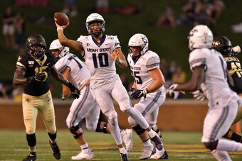 WINSTON SALEM, NORTH CAROLINA - AUGUST 30: Jordan Love #10 of the Utah State Aggies against the Wake Forest Demon Deacons during their game at BB&T Field on August 30, 2019 in Winston Salem, North Carolina. Wake Forest won 38-35. (Photo by Grant Halverson