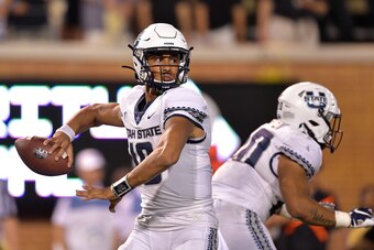 WINSTON SALEM, NORTH CAROLINA - AUGUST 30: Jordan Love #10 of the Utah State Aggies against the Wake Forest Demon Deacons during their game at BB&T Field on August 30, 2019 in Winston Salem, North Carolina. Wake Forest won 38-35. (Photo by Grant Halverson