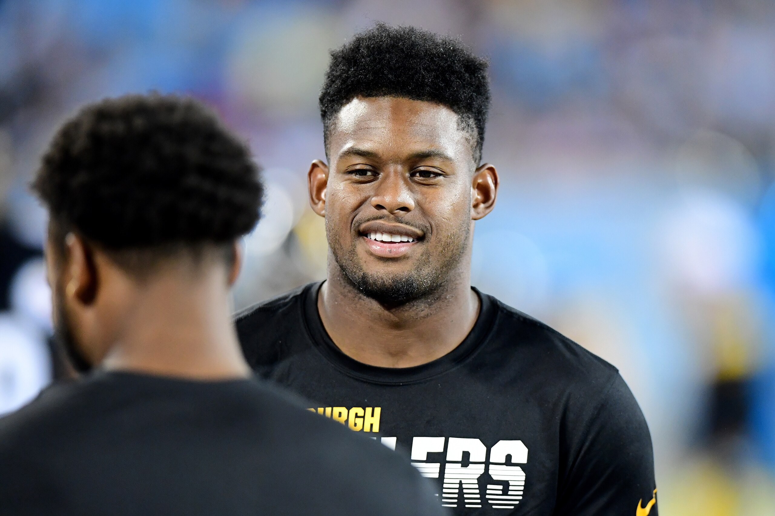 CHARLOTTE, NORTH CAROLINA - AUGUST 29: JuJu Smith-Schuster #19 of the Pittsburgh Steelers talks on the sideline during their preseason game against the Carolina Panthers at Bank of America Stadium on August 29, 2019 in Charlotte, North Carolina. (Photo by