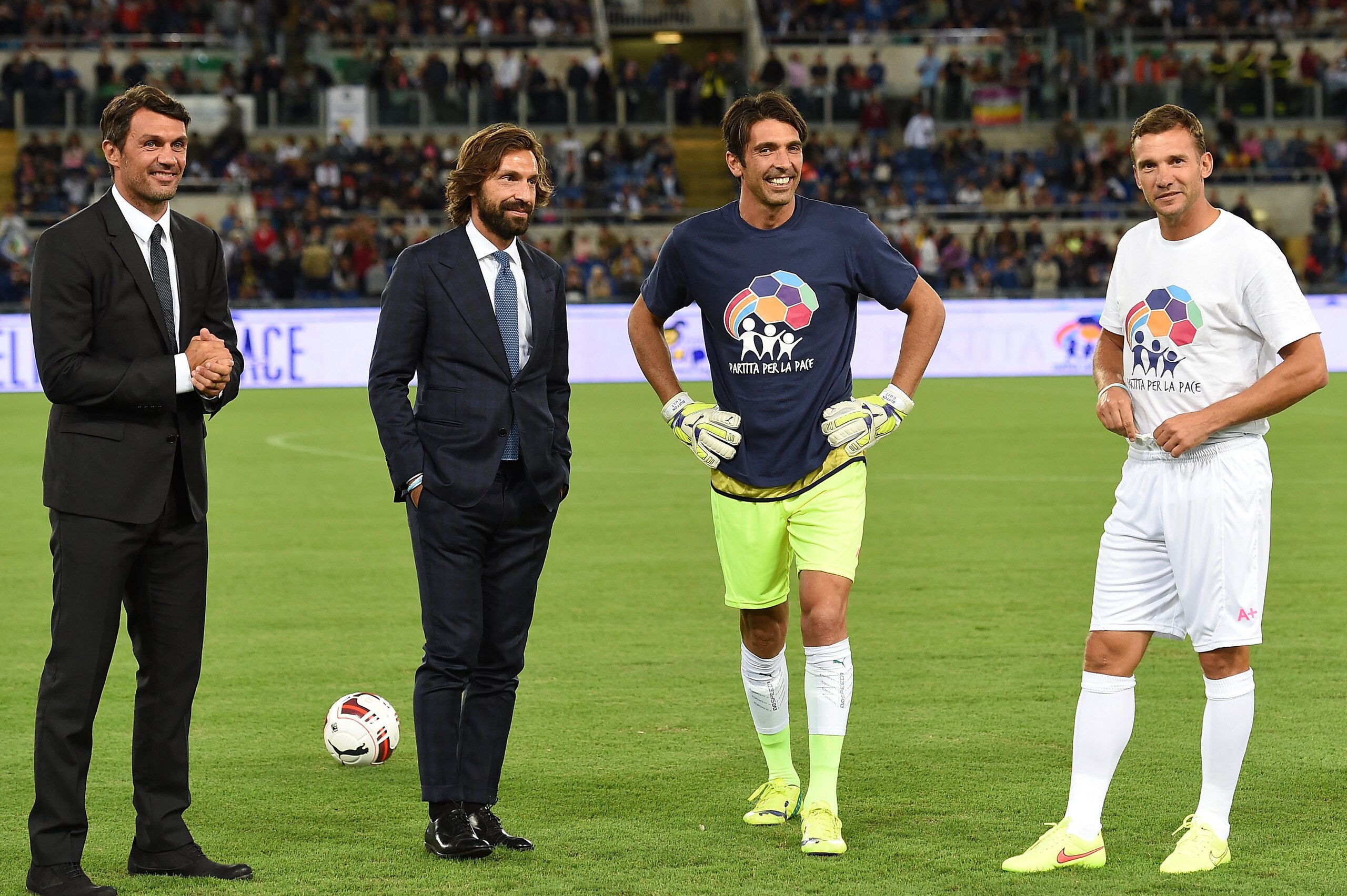 ROME, ITALY - SEPTEMBER 01:  Paolo Maldini, Andrea Pirlo, Gianluigi Buffon and Andrey Shevchenko before Interreligious Match for Peace  at Olimpico Stadium on September 1, 2014 in Rome, Italy.  (Photo by Giuseppe Bellini/Getty Images)