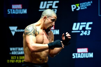 MELBOURNE, AUSTRALIA - OCTOBER 03:  Robert Whittaker of New Zealand holds an open training session for fans and media during UFC 243 open workouts at Federation Square on October 3, 2019 in Melbourne, Australia. (Photo by Jeff Bottari/Zuffa LLC/Zuffa LLC 
