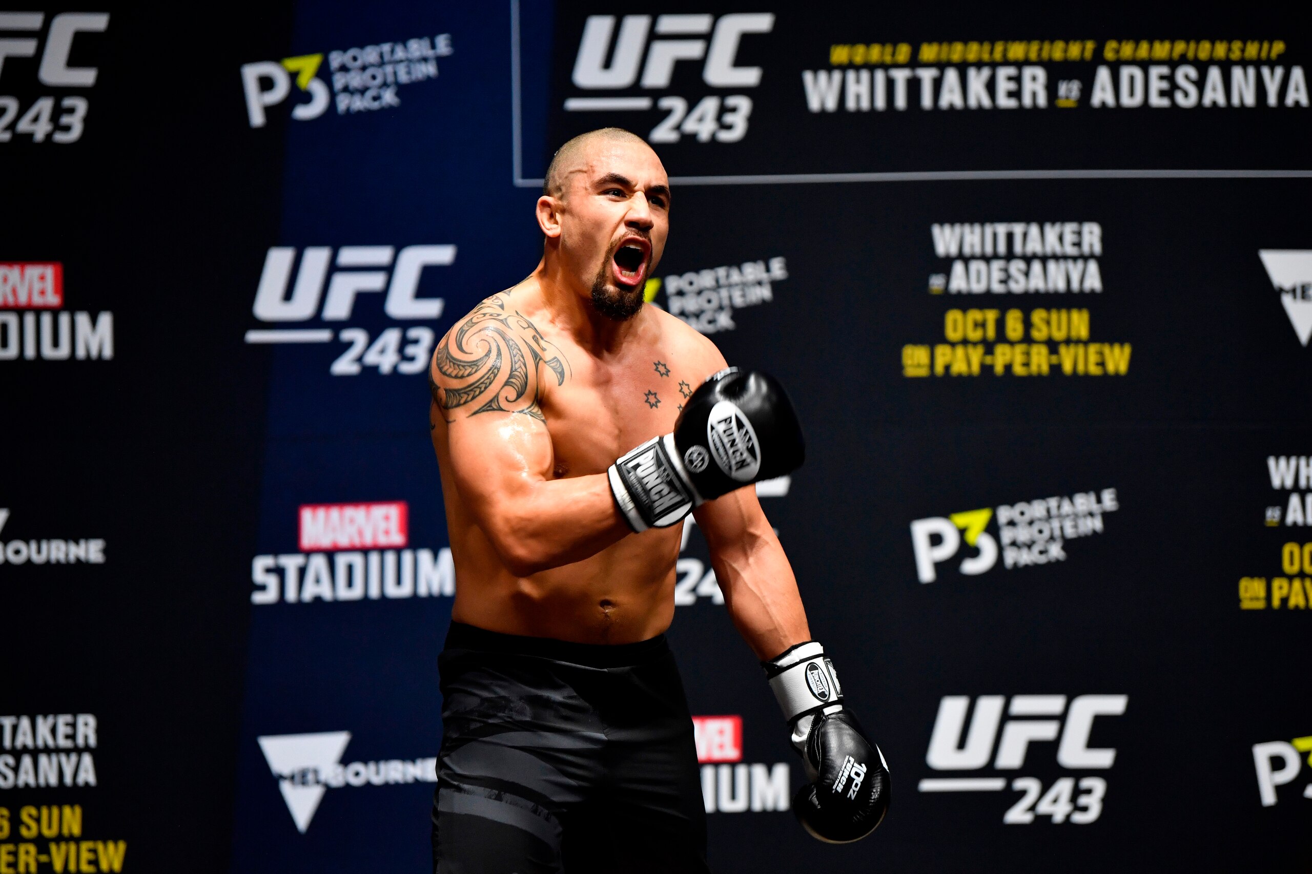 MELBOURNE, AUSTRALIA - OCTOBER 03:  Robert Whittaker of New Zealand holds an open training session for fans and media during UFC 243 open workouts at Federation Square on October 3, 2019 in Melbourne, Australia. (Photo by Jeff Bottari/Zuffa LLC/Zuffa LLC 